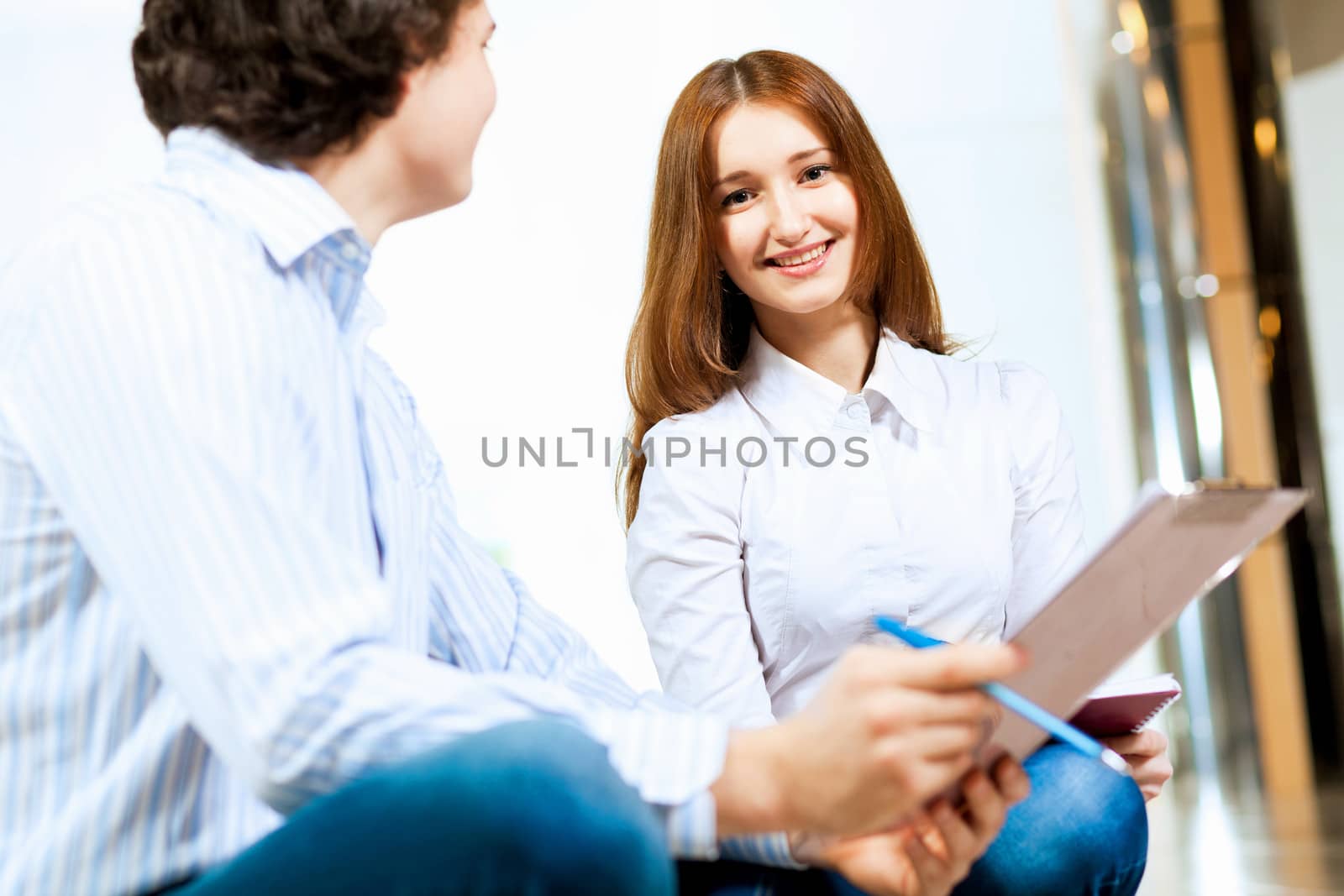 Two students smiling by sergey_nivens