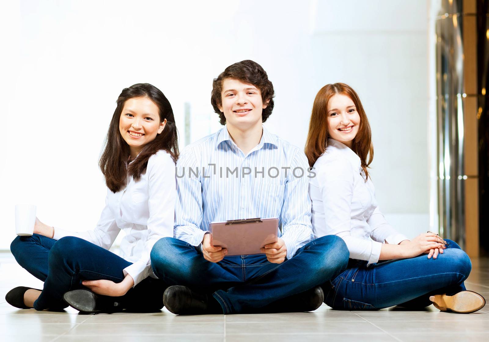 Three students smiling by sergey_nivens