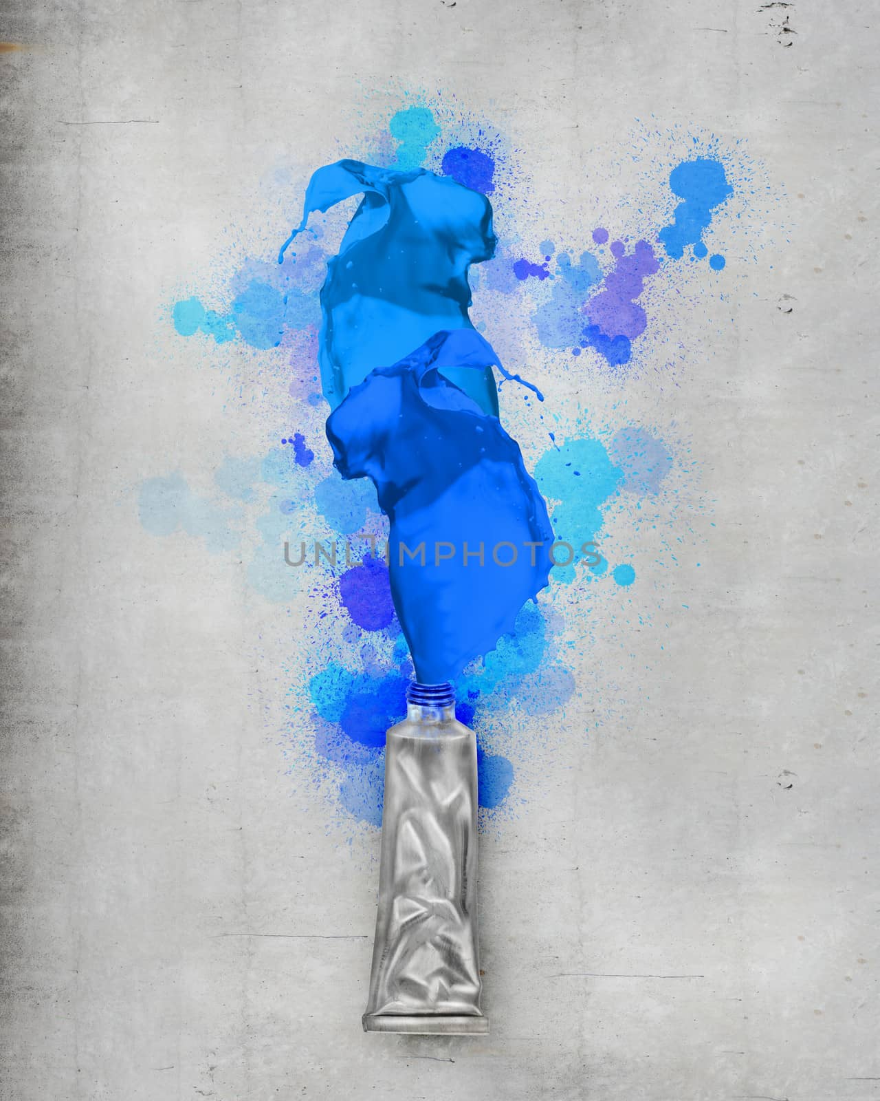 Image of paint tube with color splashes