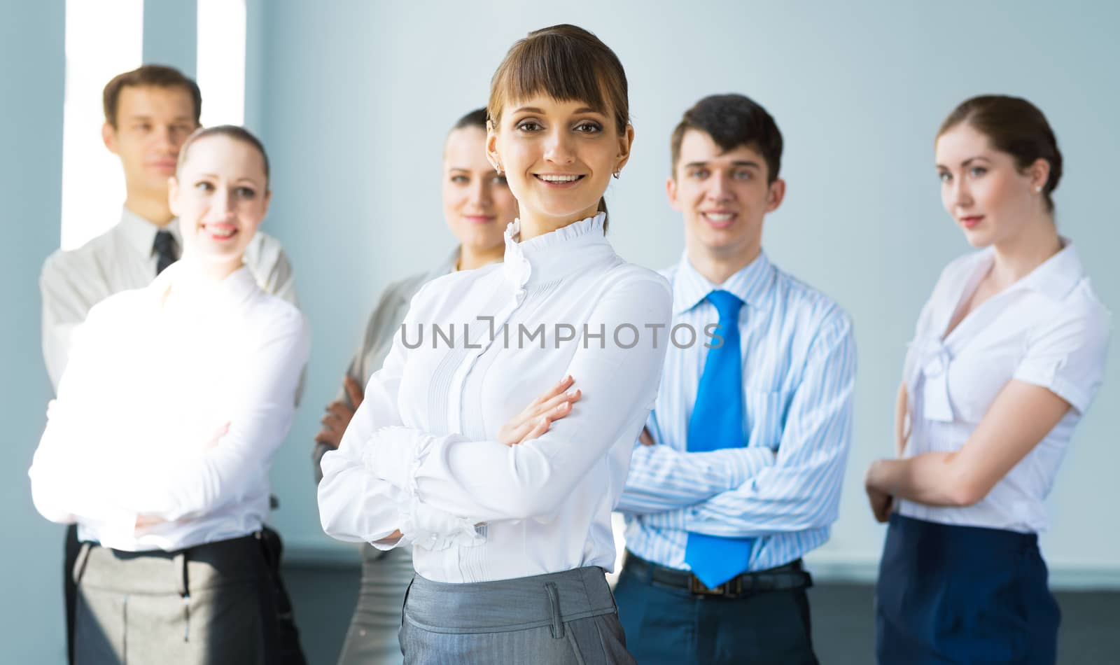 concept of teamwork, business woman crossed her arms over her team