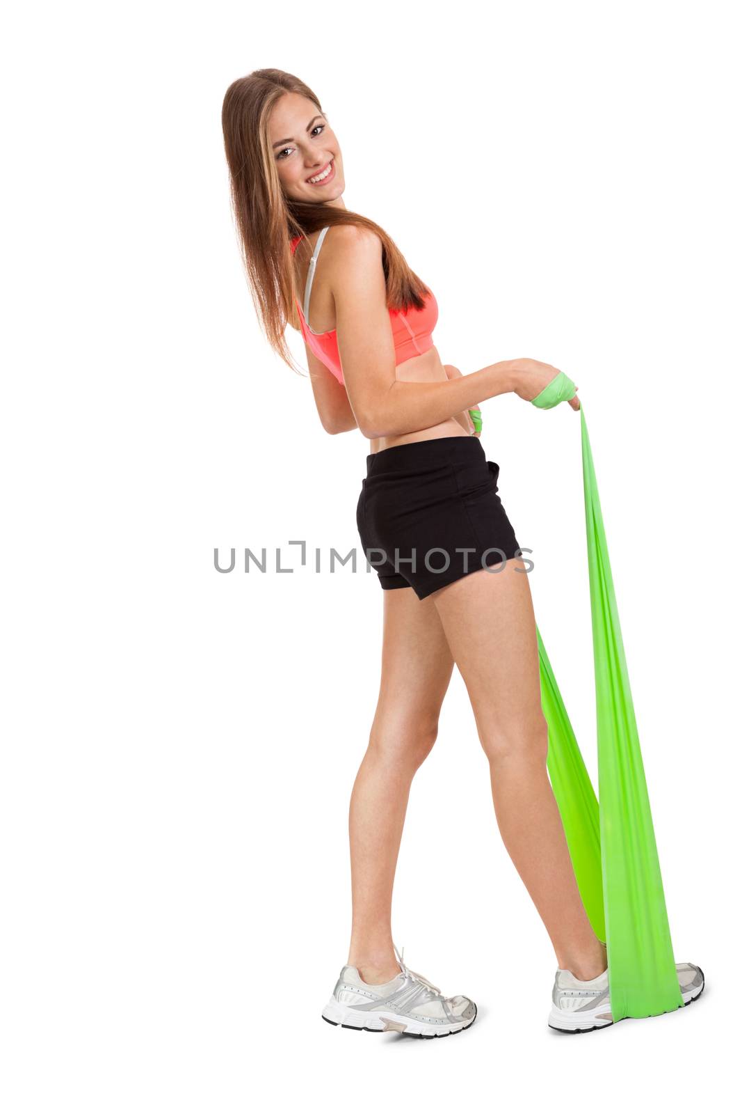 athletic young woman doing workout with physio tape latex tape isolated on white