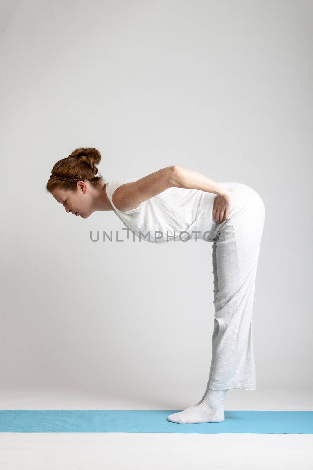 best ager exercising yoga by bernjuer