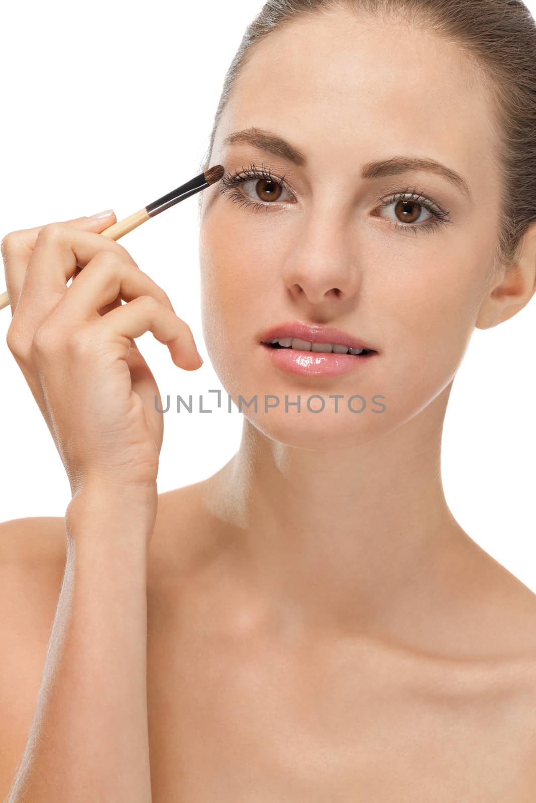 attractive woman in beauty salon make up brown eyeshadow professional 