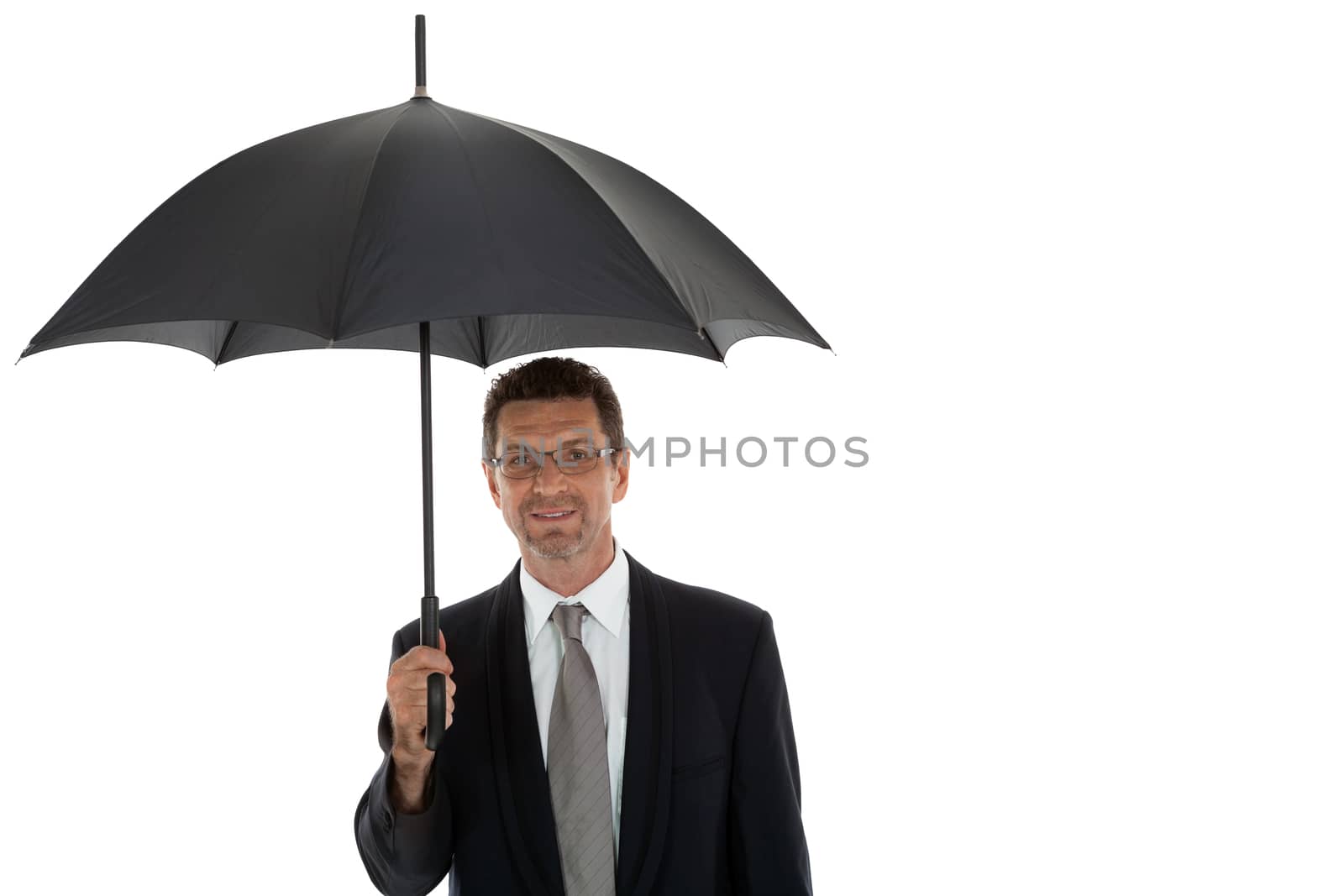 mature attractive business man with umbrella isolated on white