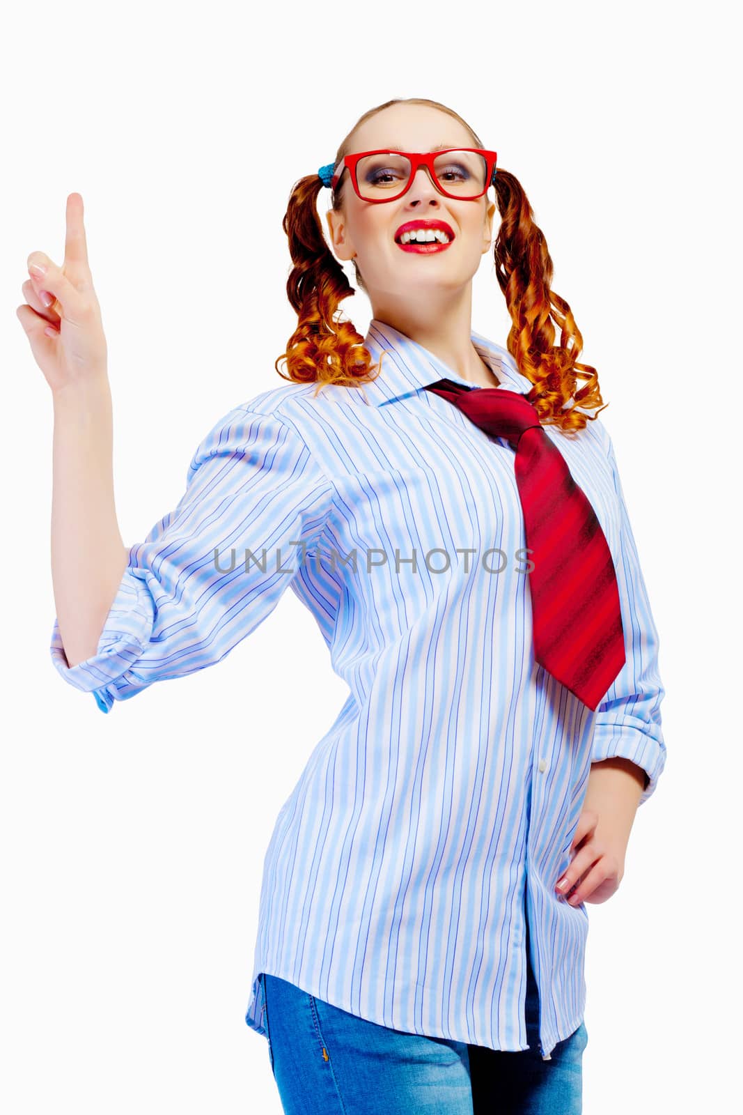 Image of pretty teenager girl in red glasses pointing with finger