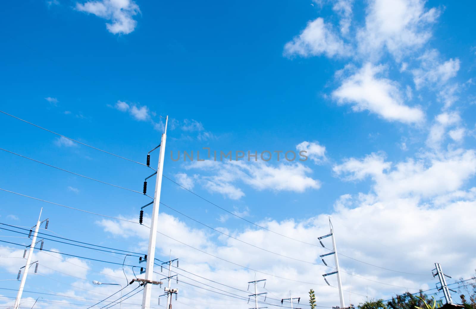 the electricity pole with blue sky background