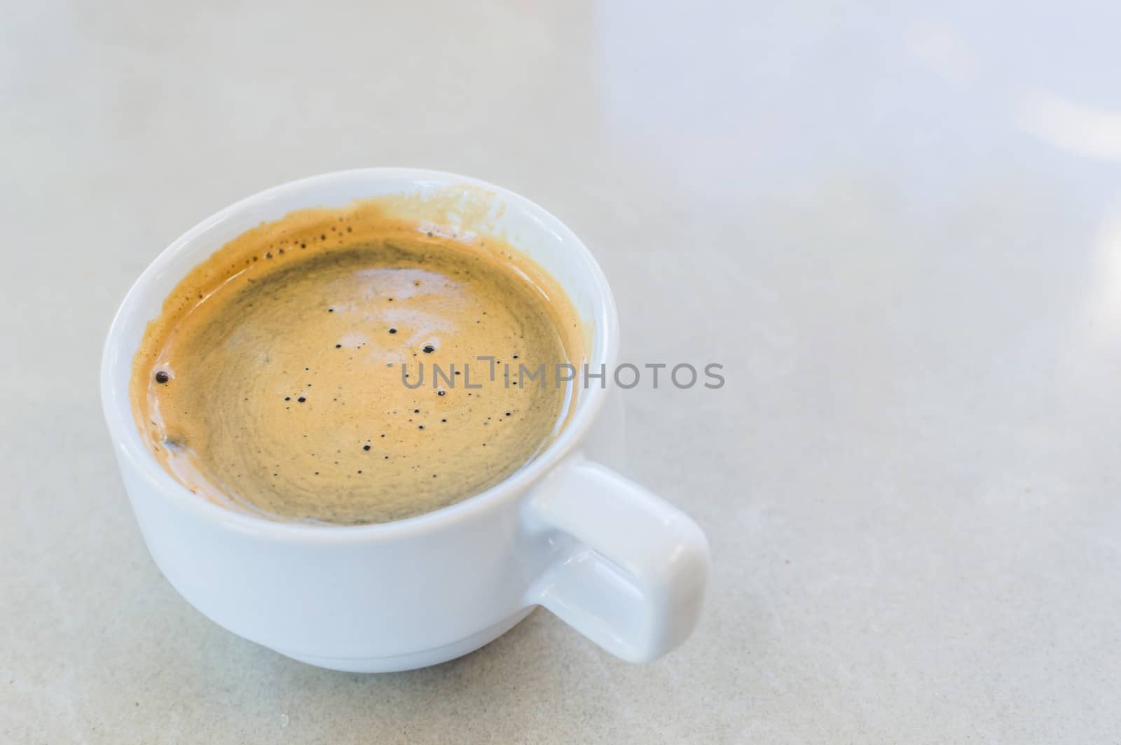 Hot Coffee in white cup and drink it in the morning with breakfast.