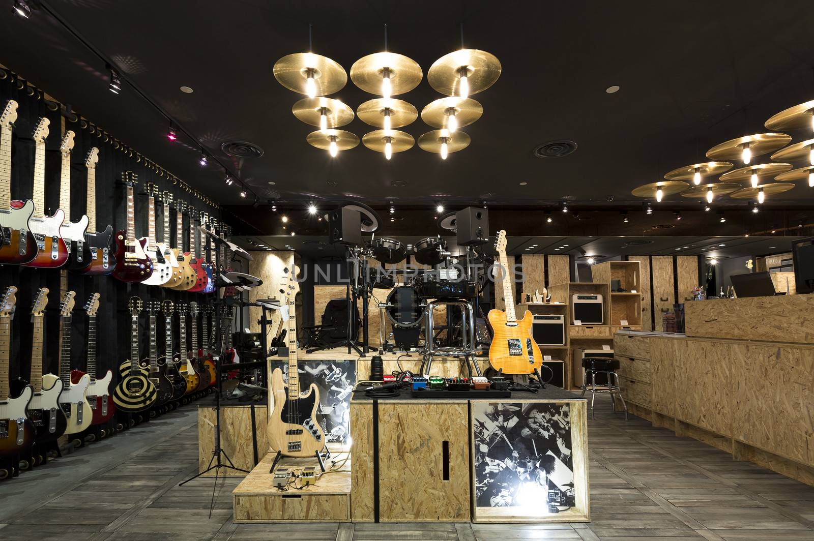 Horizontial shot of inside a musical instrument store.