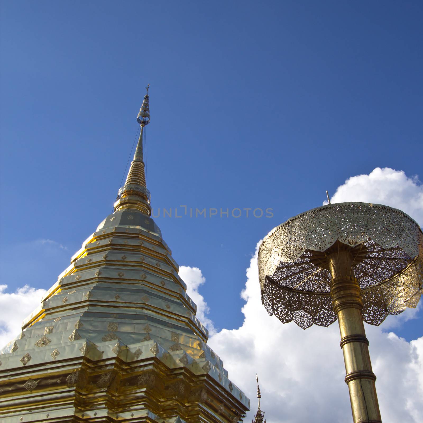 Golden sculpture and blue sky at Wat Phra That Doi Suthep