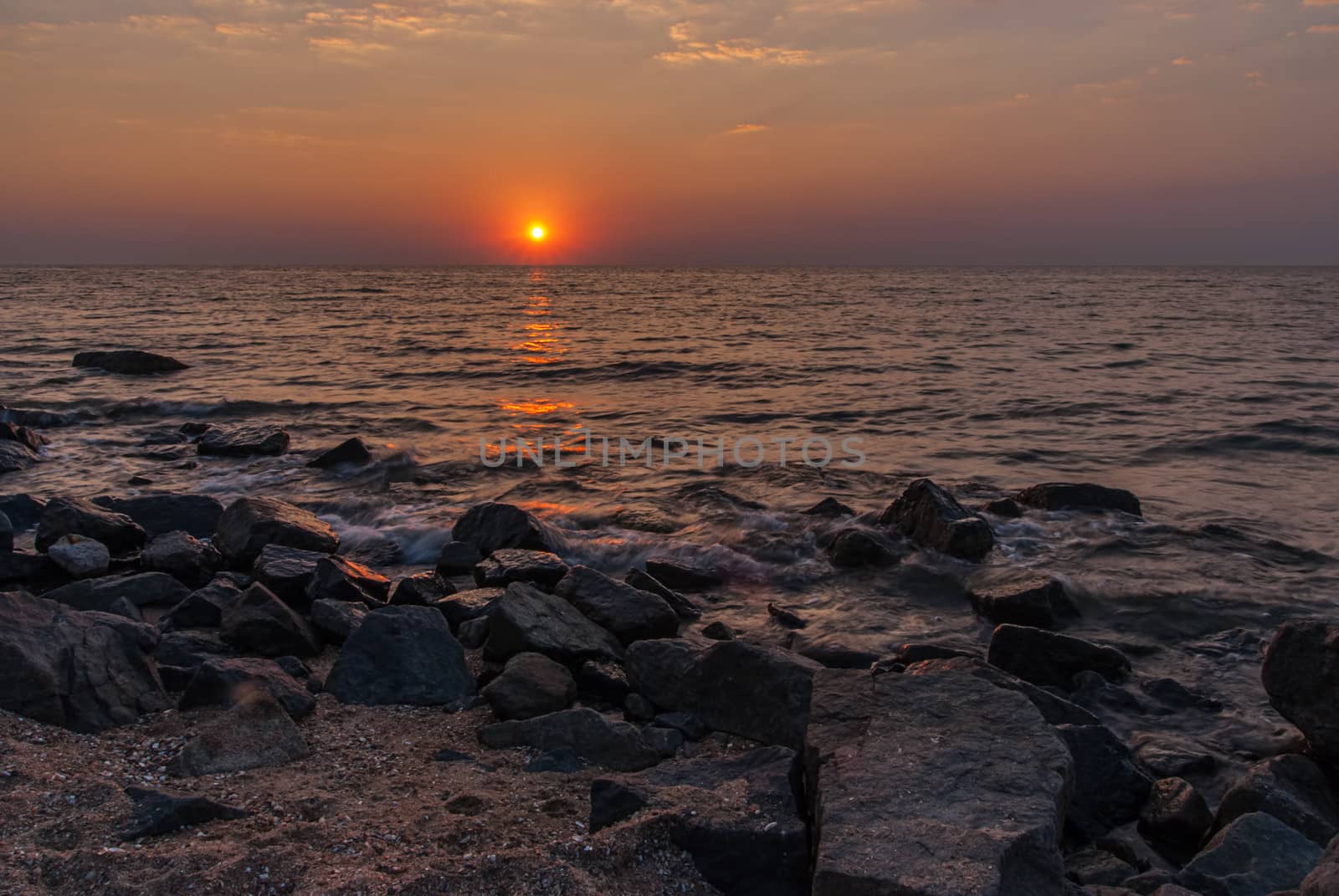 red purple sunset over the sea by Zhukow