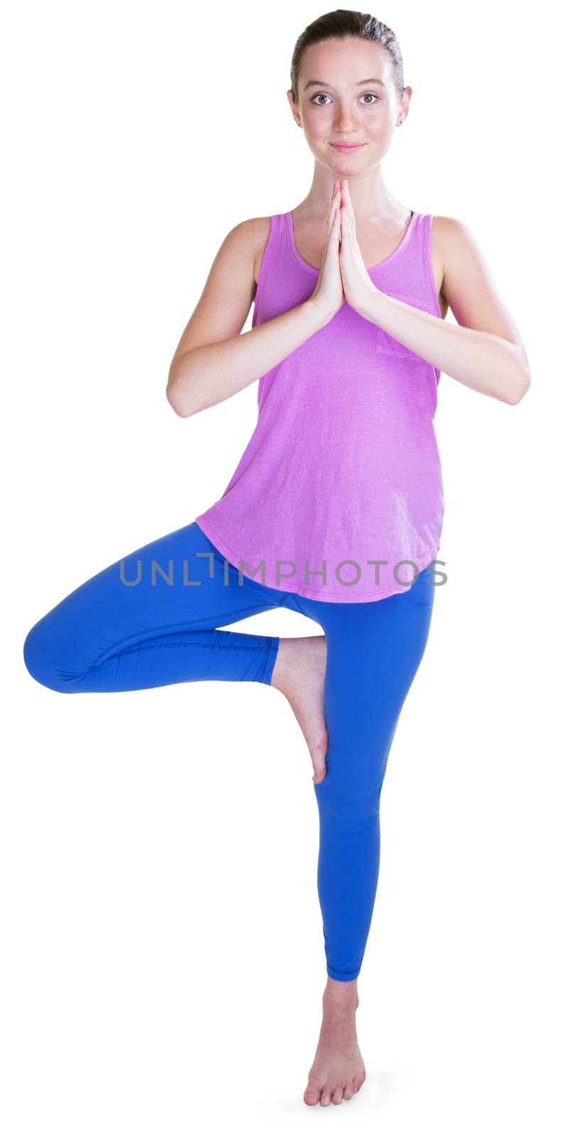 Athletic young woman in tights balancing on leg