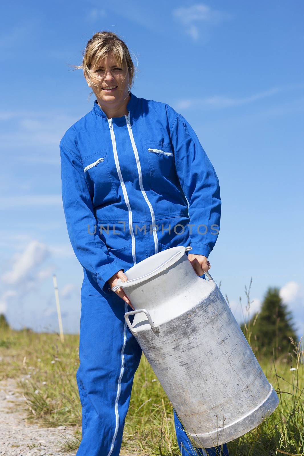 woman farmer holding big bertha