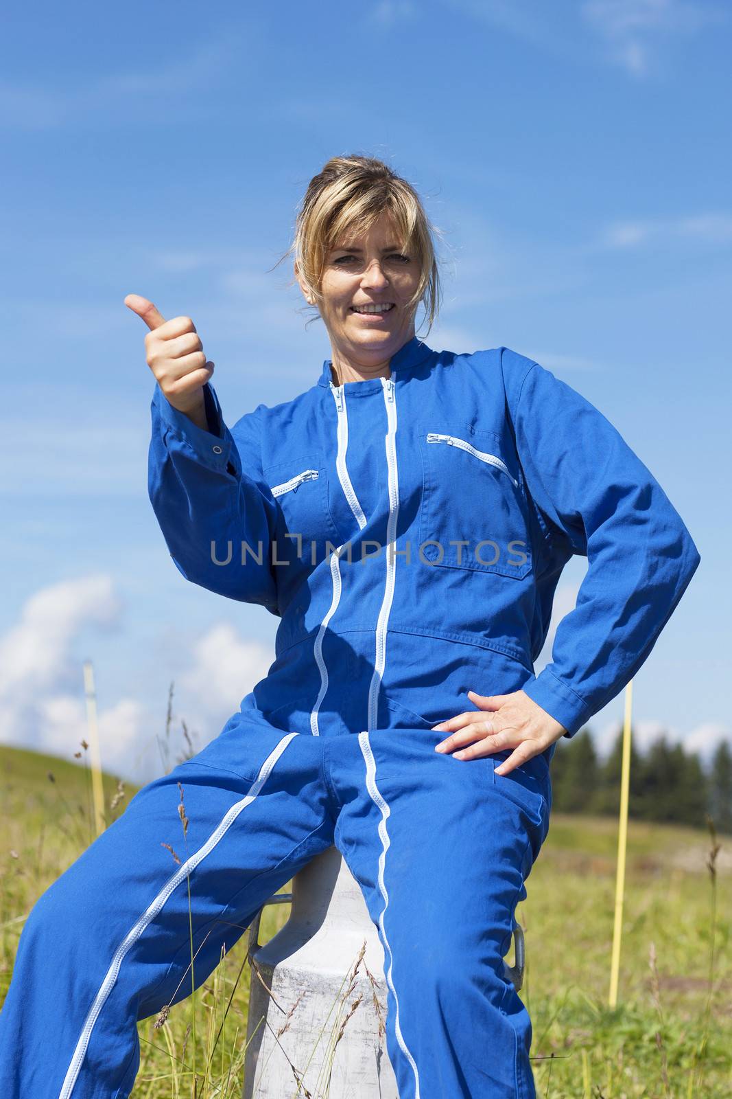 woman farmer with thumb up by vwalakte