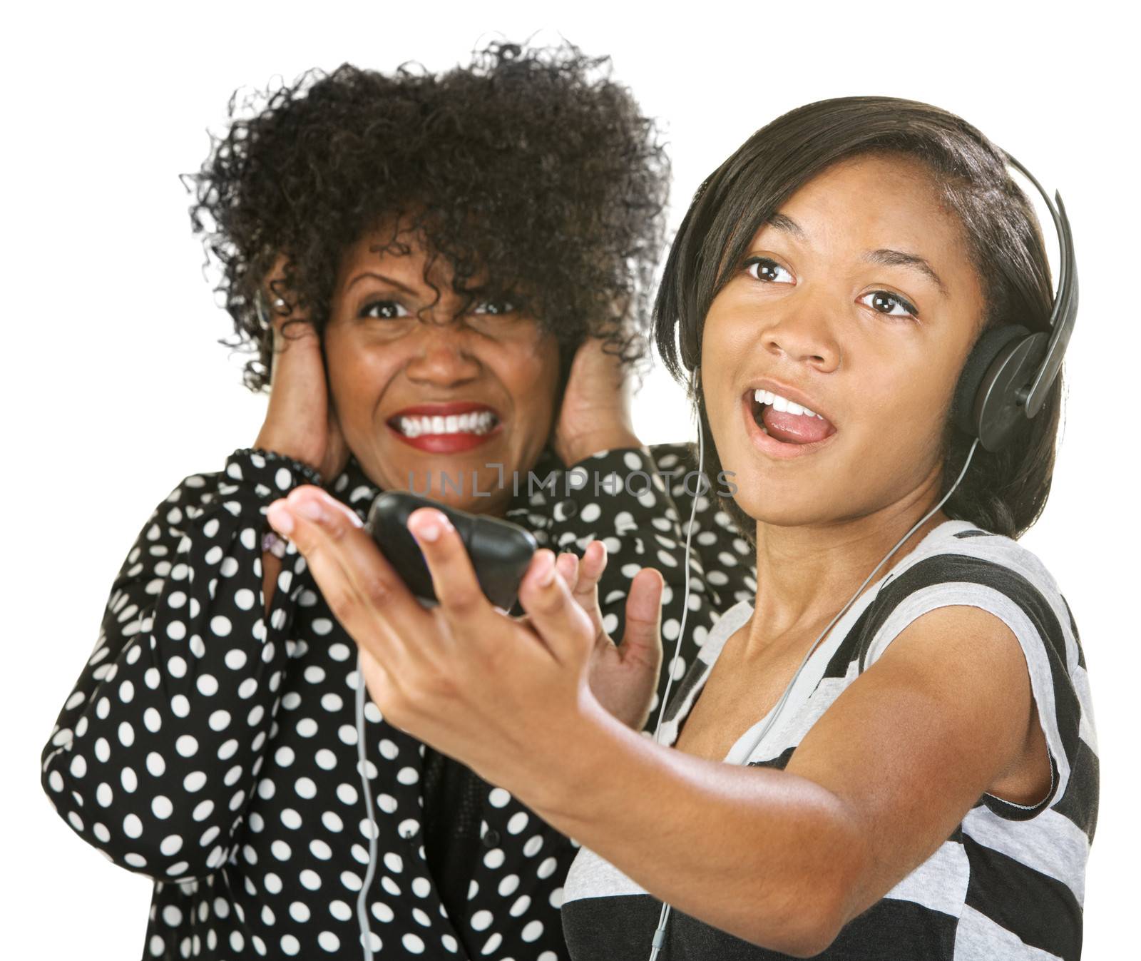 Woman covering her ears while young person sings