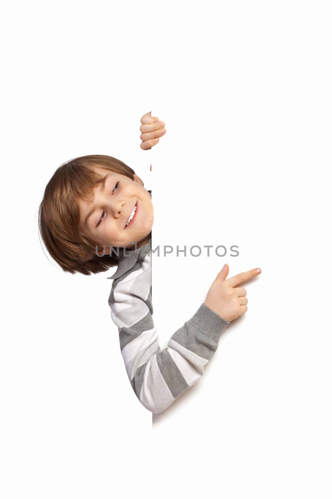 Little boy holding a blank white billboard