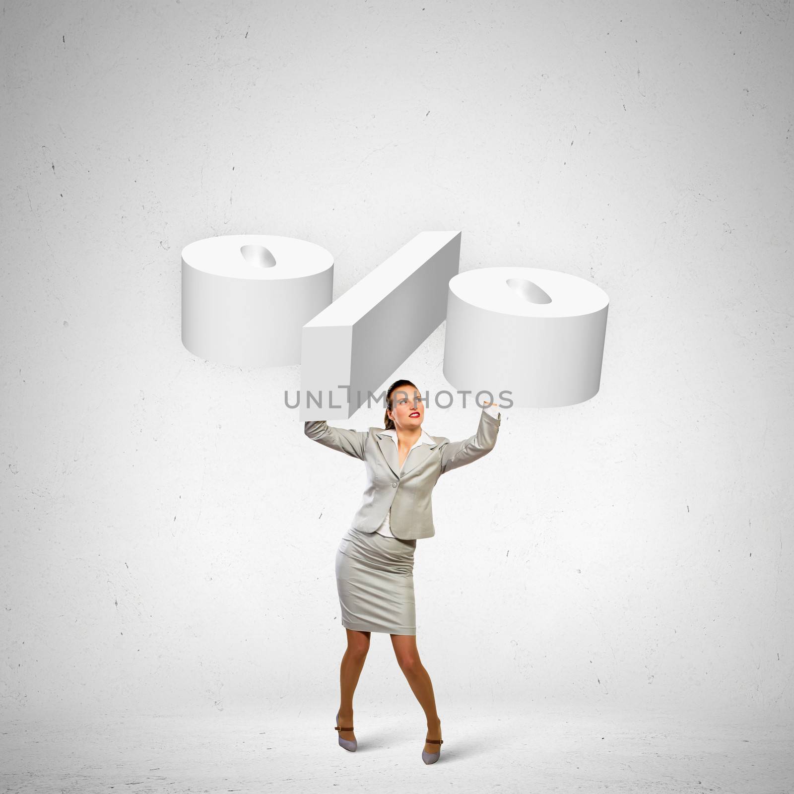Image of businesswoman holding percentage symbol above head