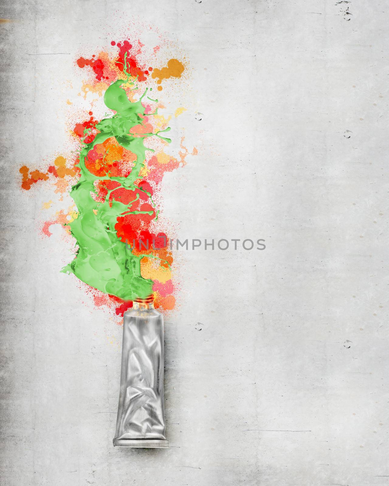 Image of paint tube with color splashes