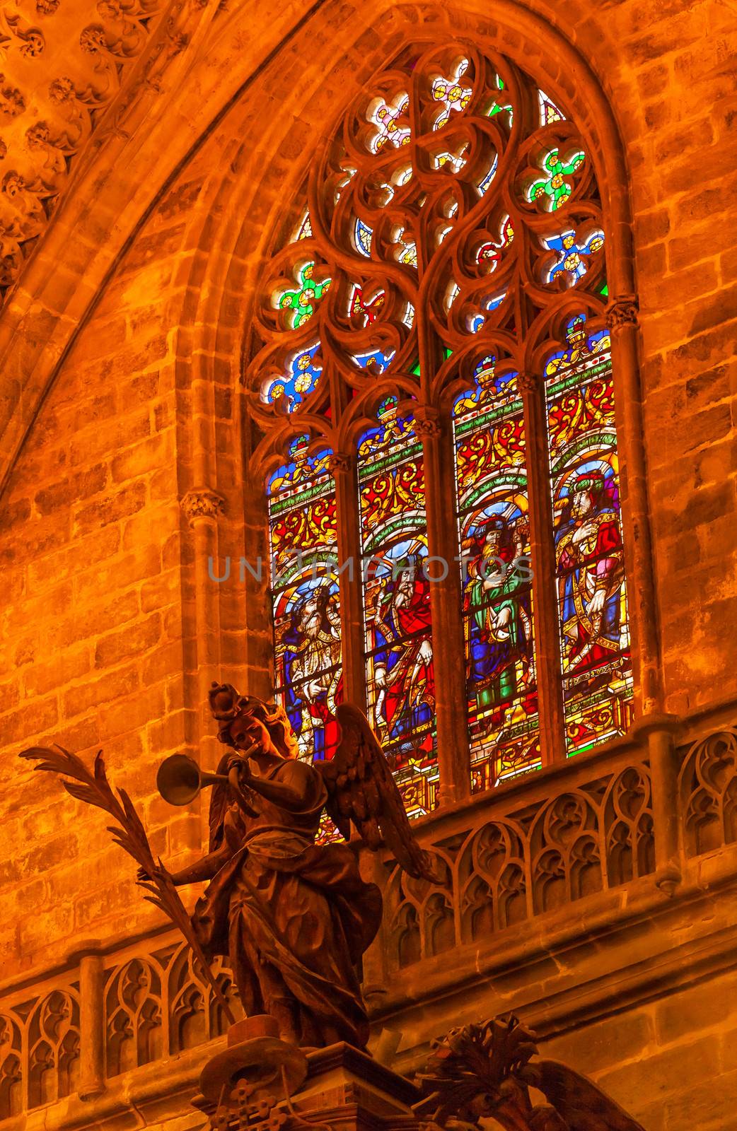 Angel Statue Stained Glass Seville Cathedral Spain by bill_perry