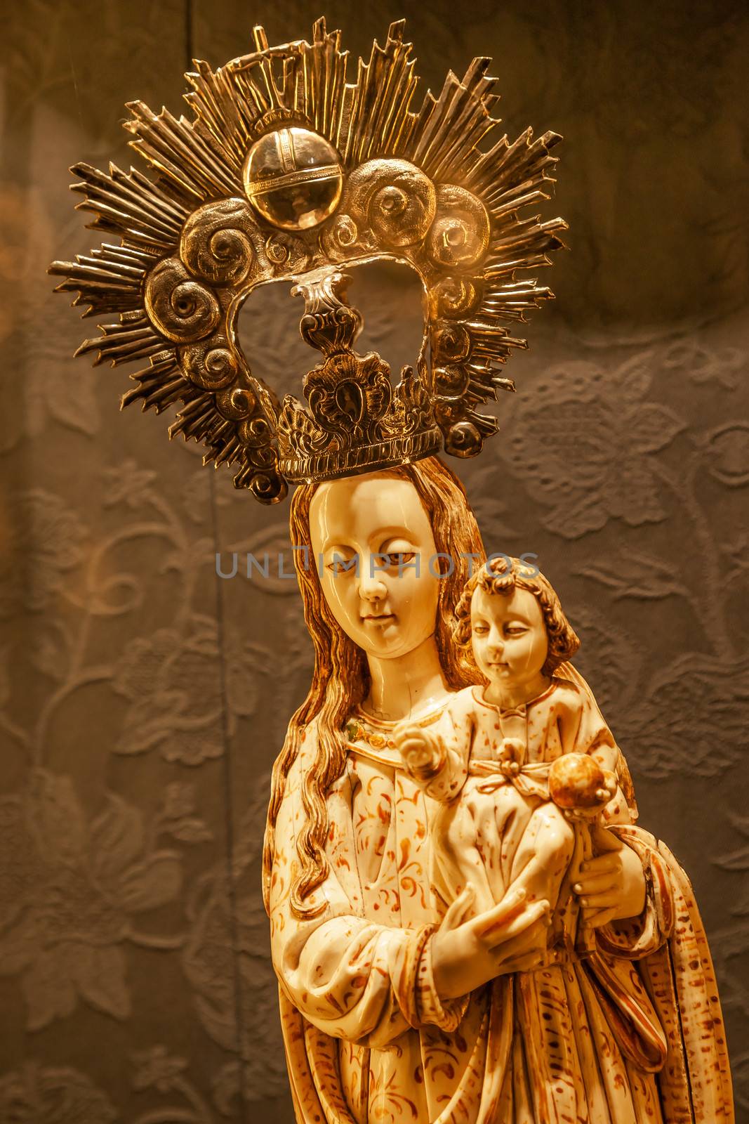 Mary Holding Baby Jesus Statue Seville Cathedral, Cathedral of Saint Mary of the See, Seville, Andalusia Spain.  Built in the 1500s. 