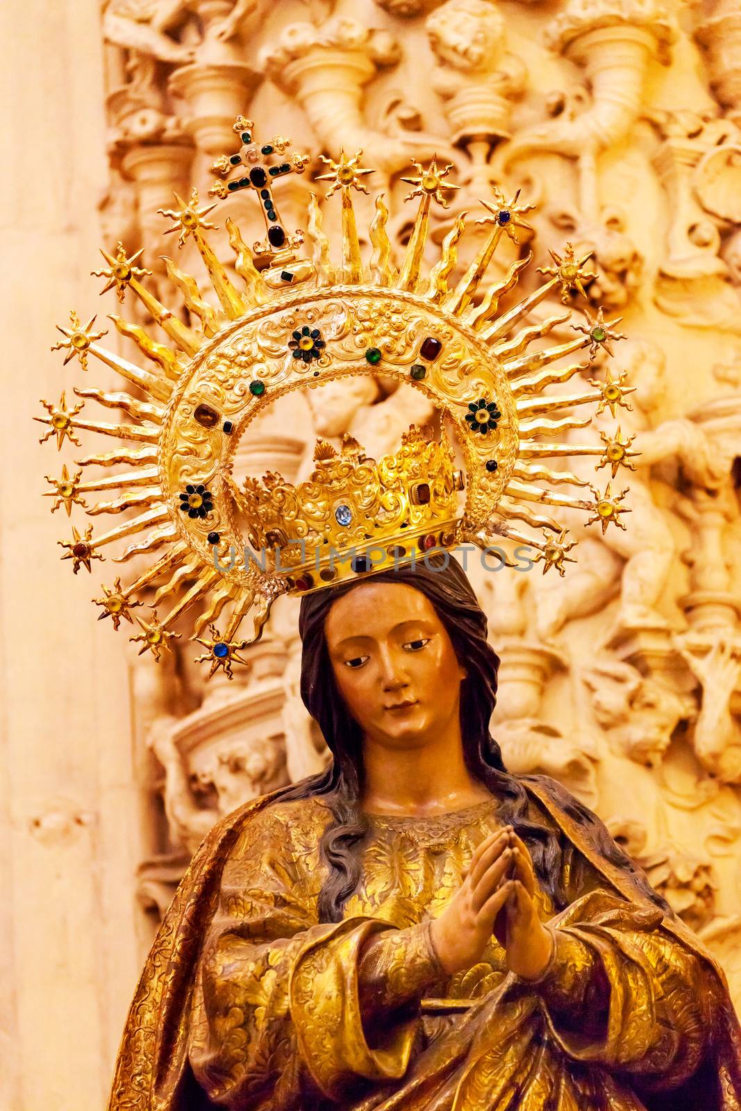 Madonna Mary Crown Statue Seville Cathedral, Cathedral of Saint Mary of the See, Seville, Andalusia Spain.  Built in the 1500s.  Largest Gothic Cathedral in the World and Third Largest Church in the World.  Burial Place of Christopher Columbus.