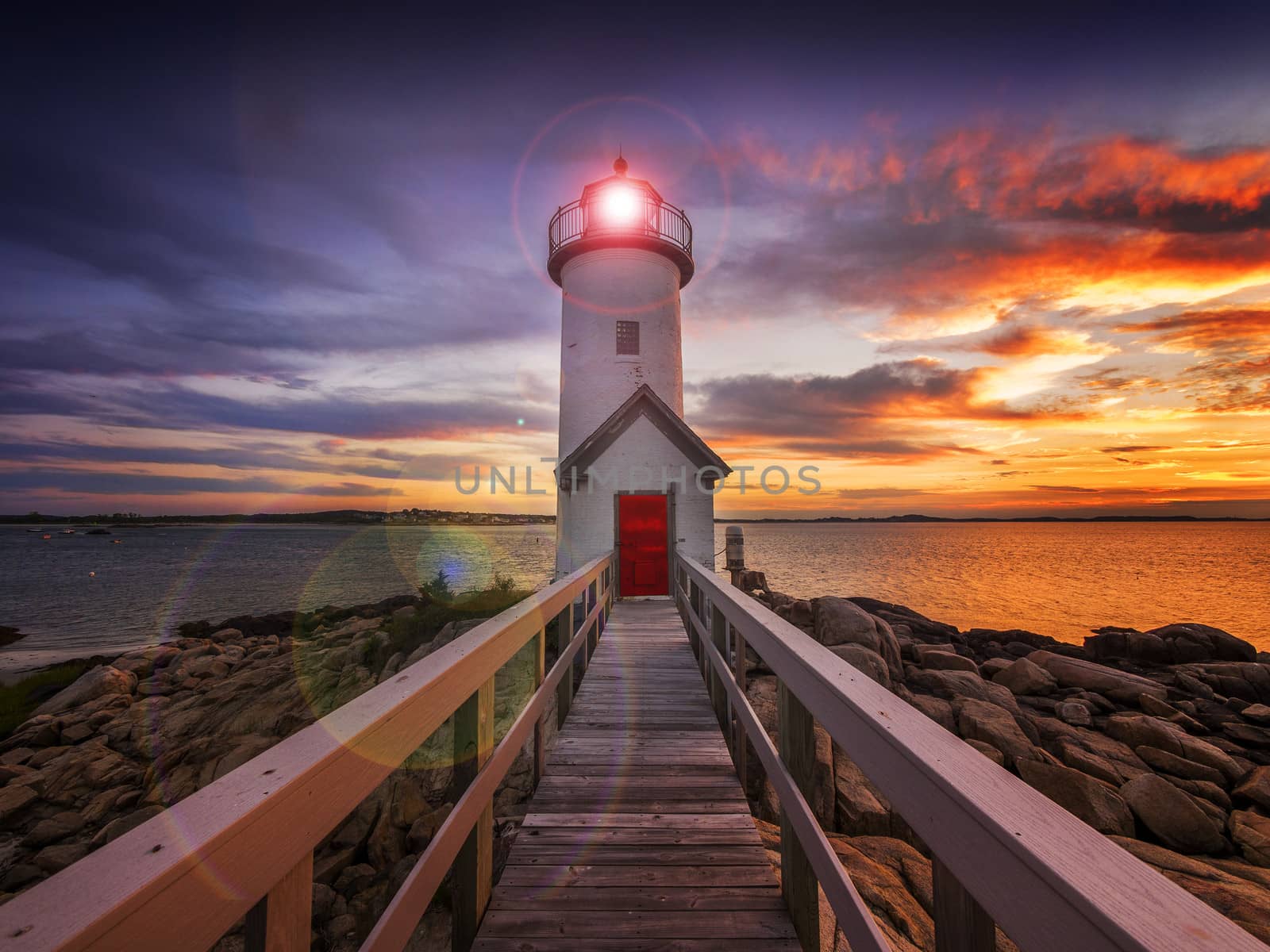 Annisquam lighthouse at sunset off the coast of Gloucester, MA. USA