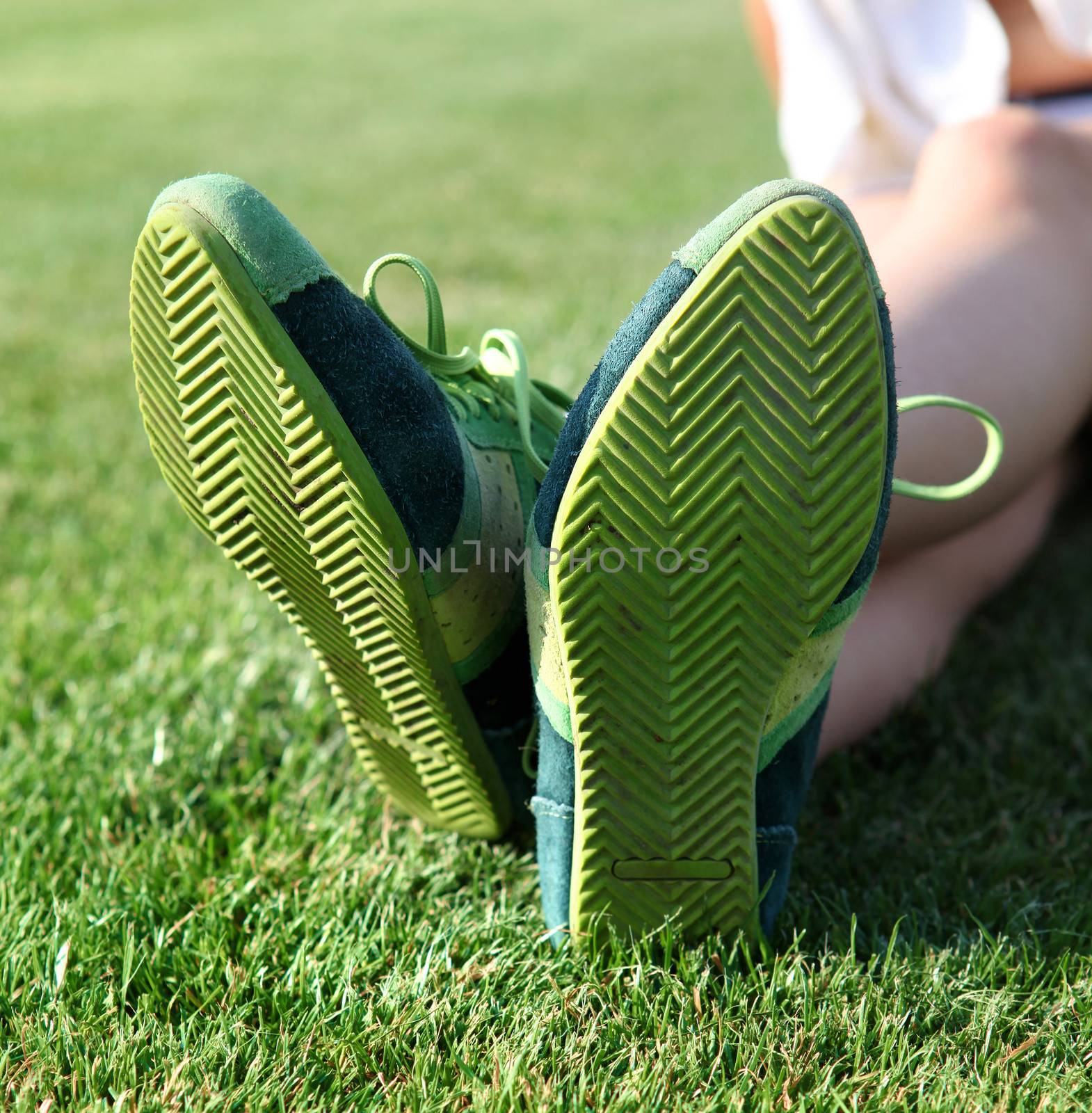 green sole of shoes on grass, gymnastics