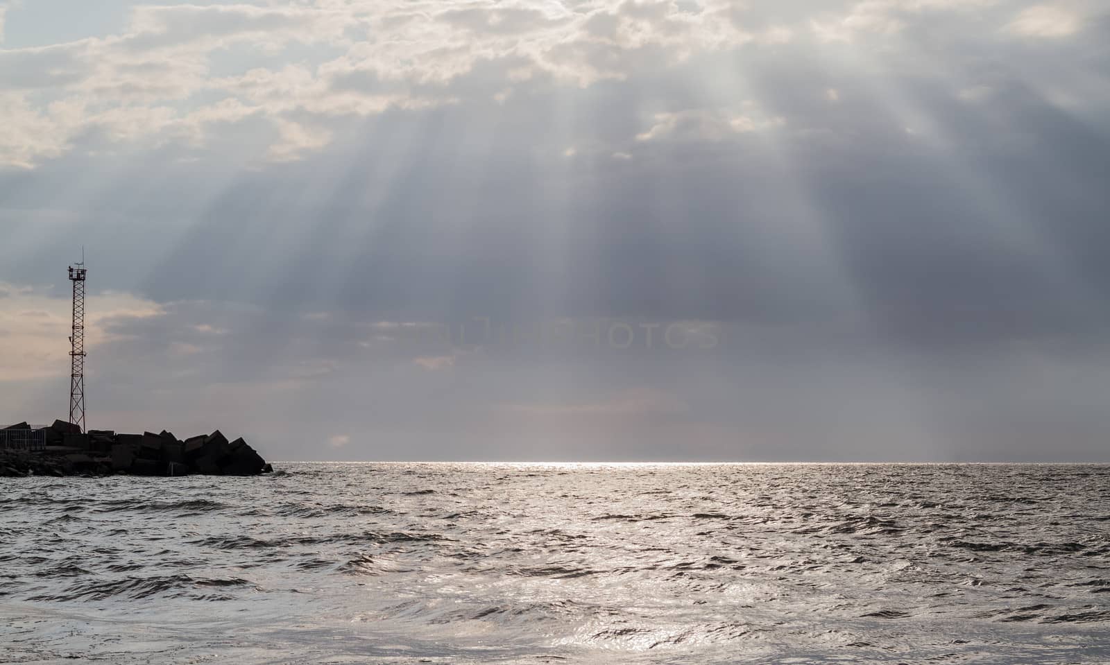 the sun's rays penetrate through clouds over the Baltic Sea, Klaipeda, Lithuania