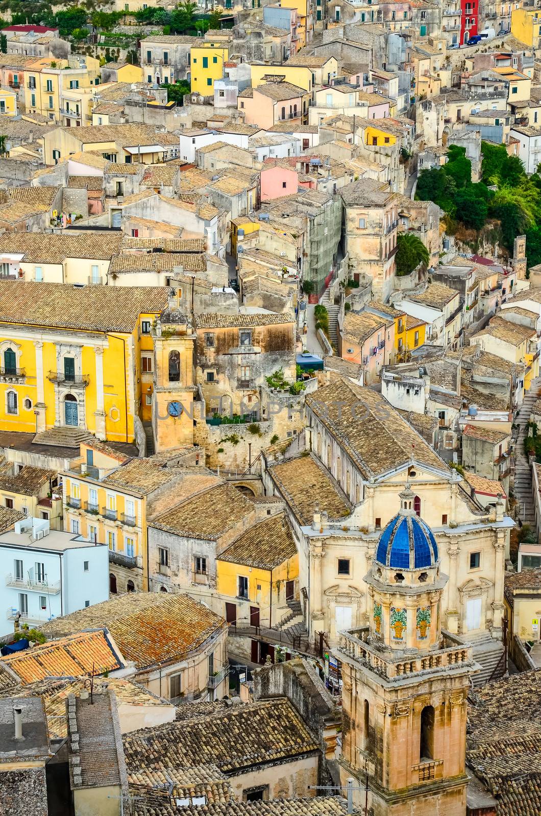 Vertical detail of colorful houses in old medieval village Ragusa in Sicily, Italy