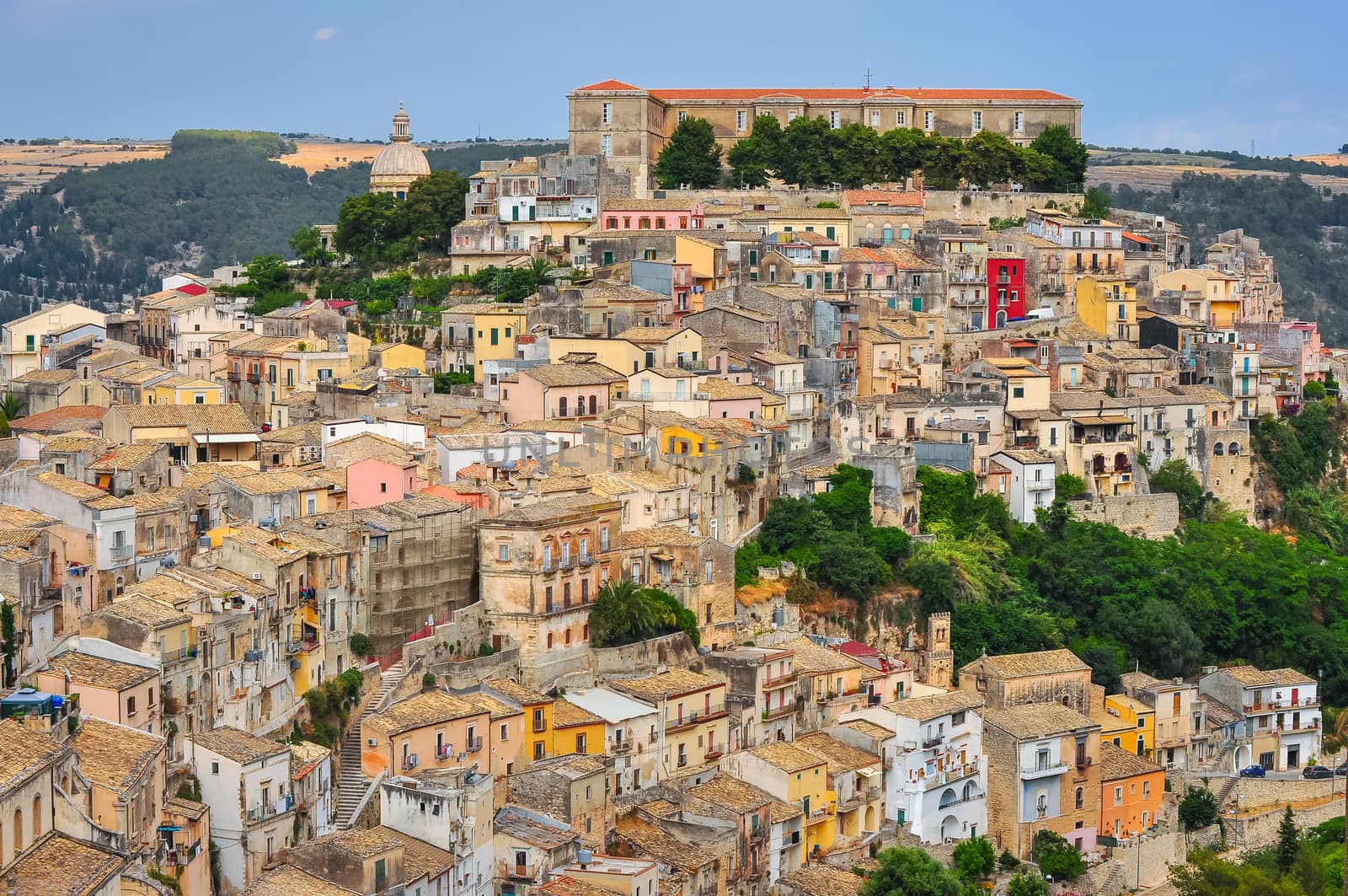 Colorful houses in old medieval village Ragusa in Sicily by martinm303