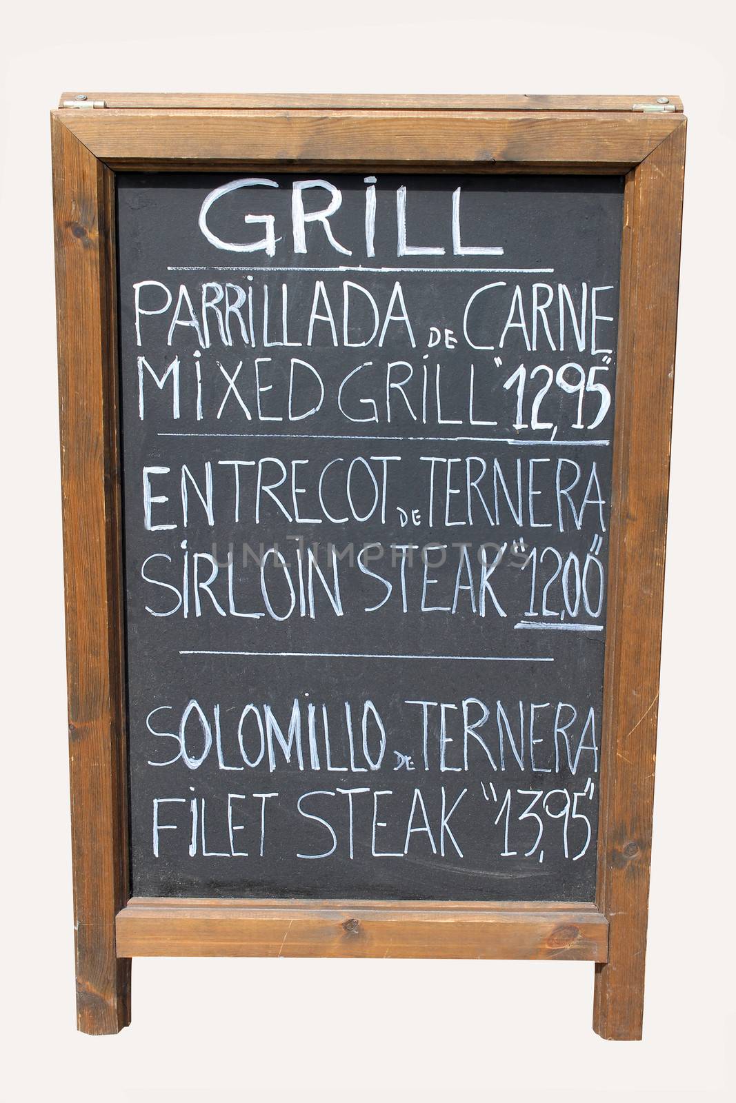 Mixed grill cafe sign on old wooden blackboard.