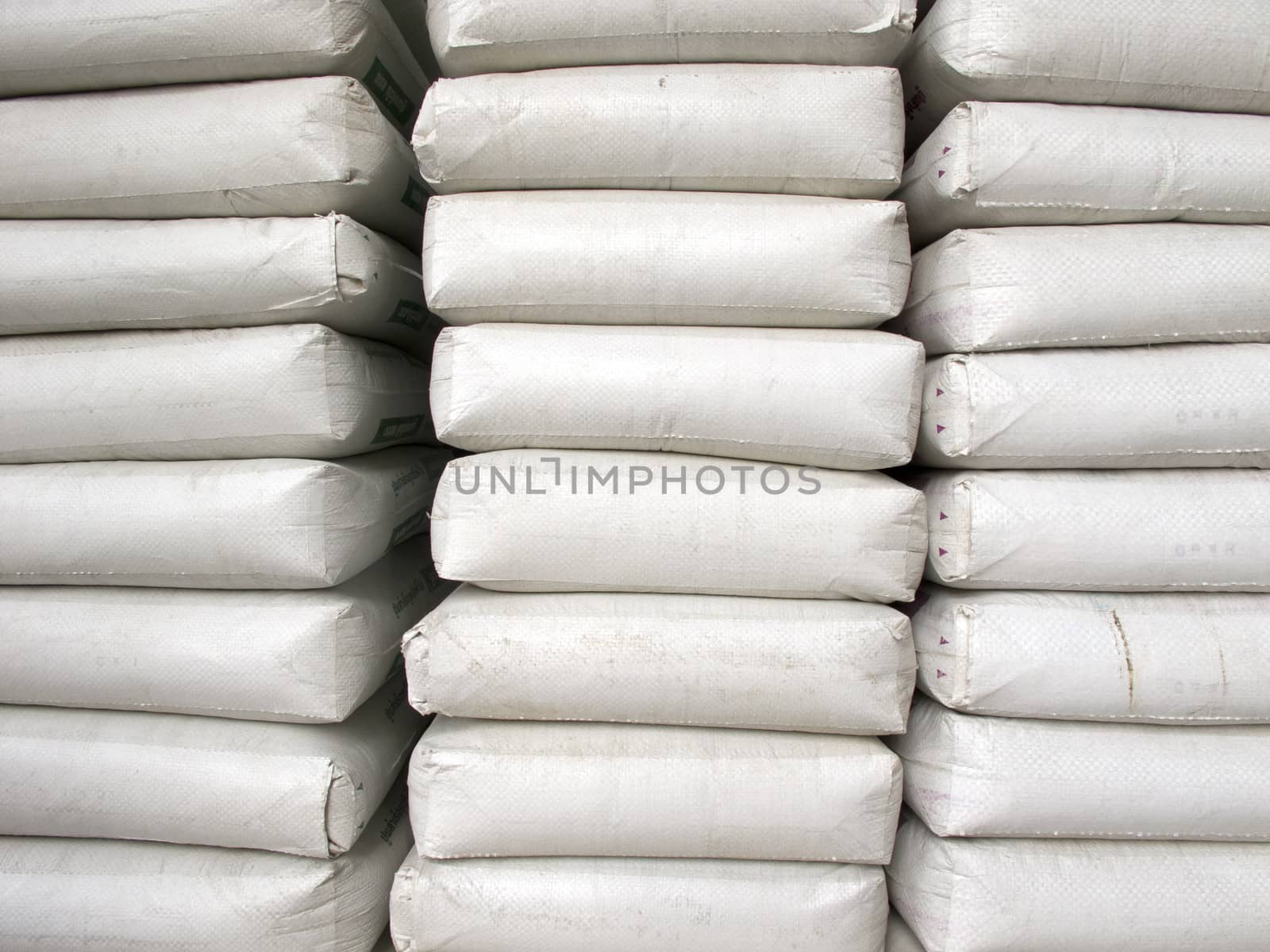 Pile of white plastic sacks by iampuay