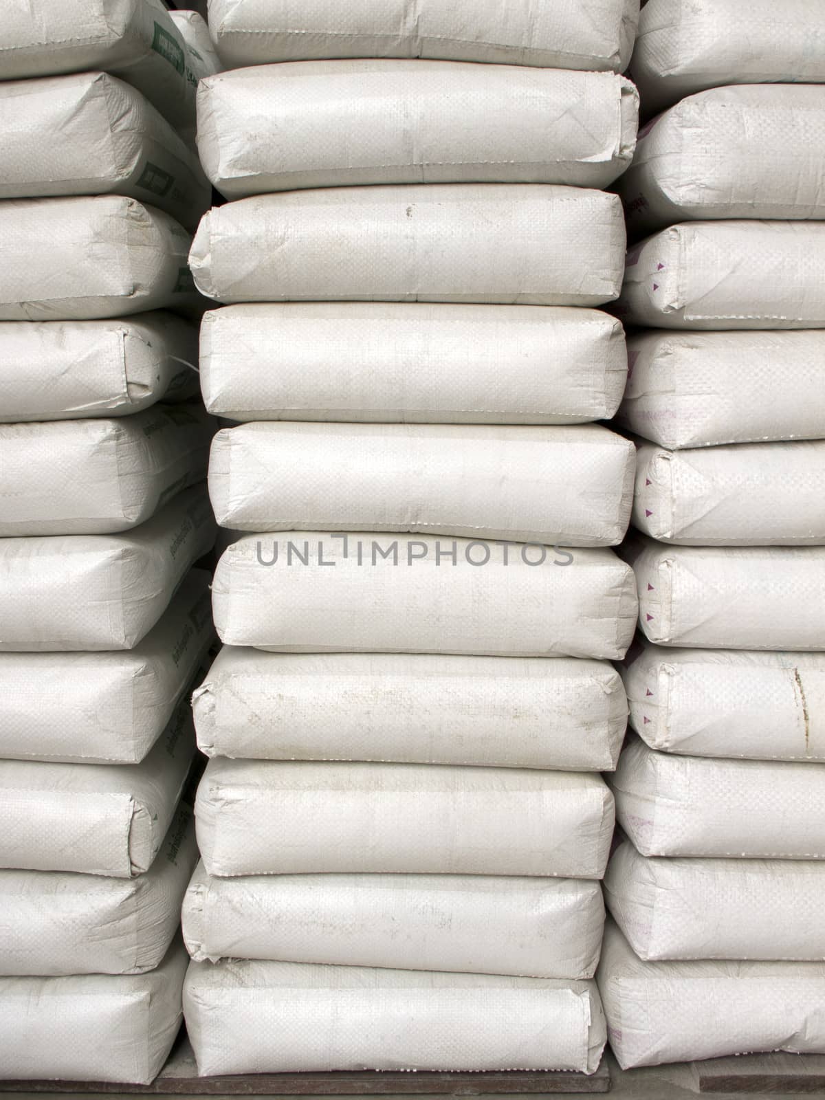 Pile of white plastic sacks by iampuay