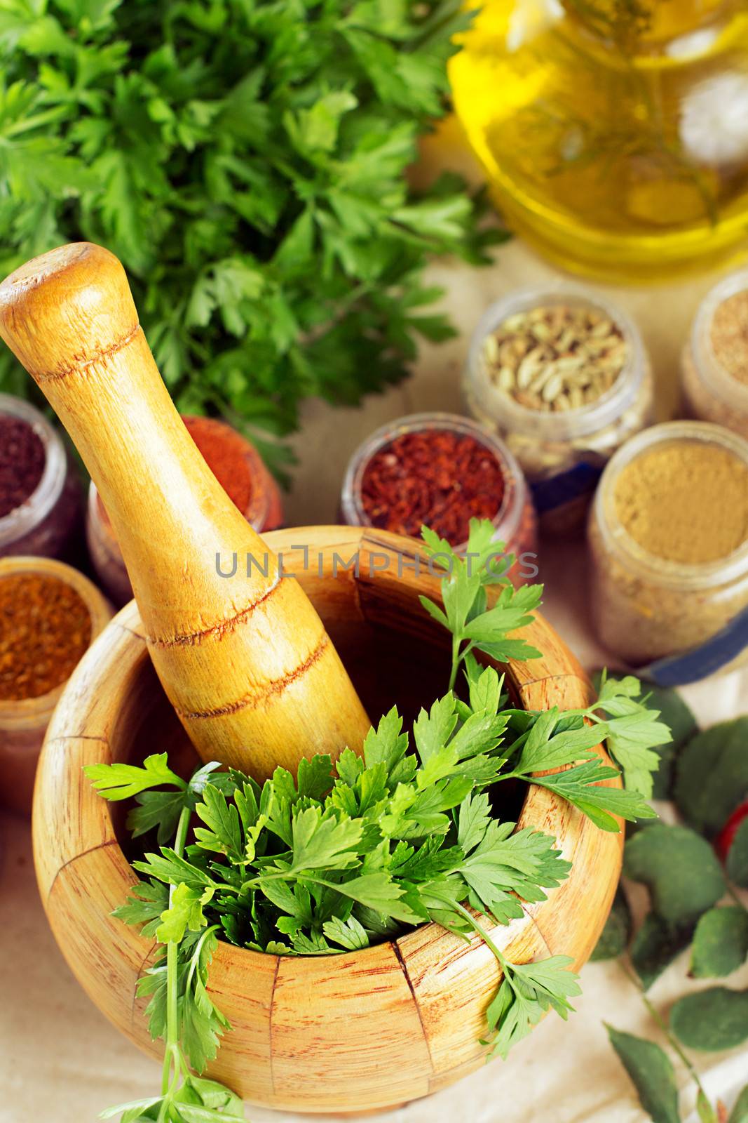 Mortar and pestle, spices on table