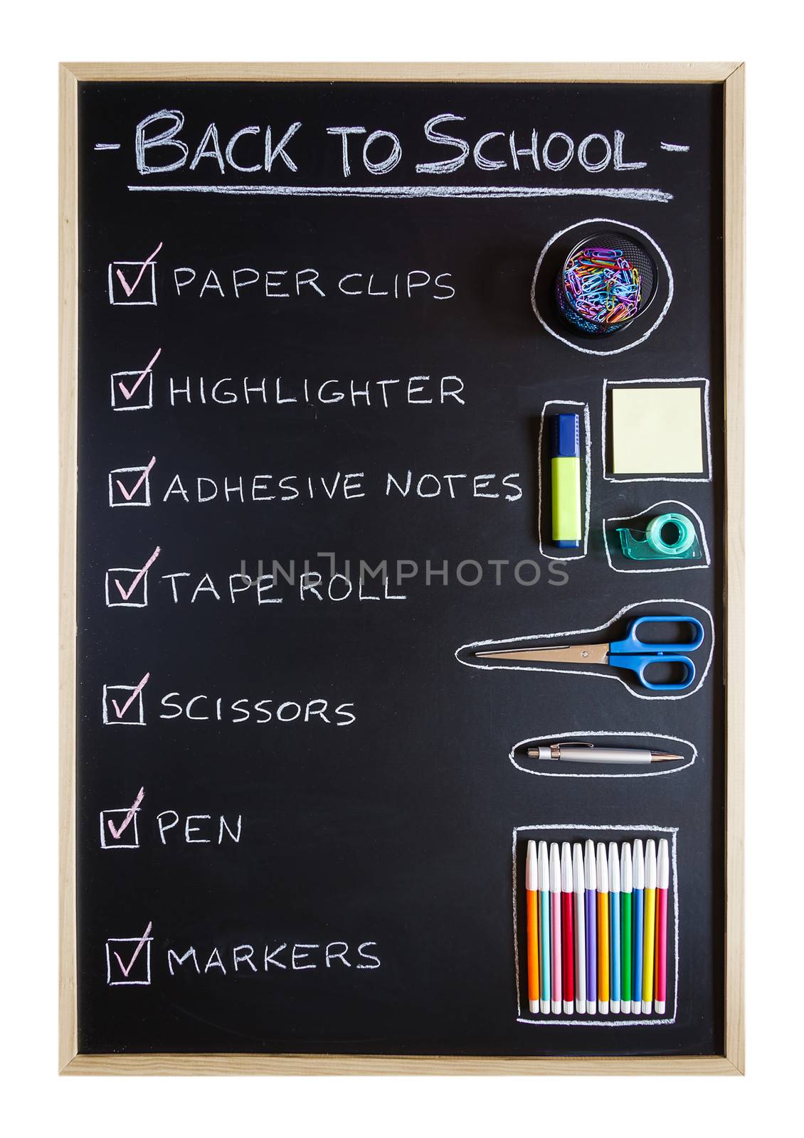 School supplies over blackboard background by doble.d