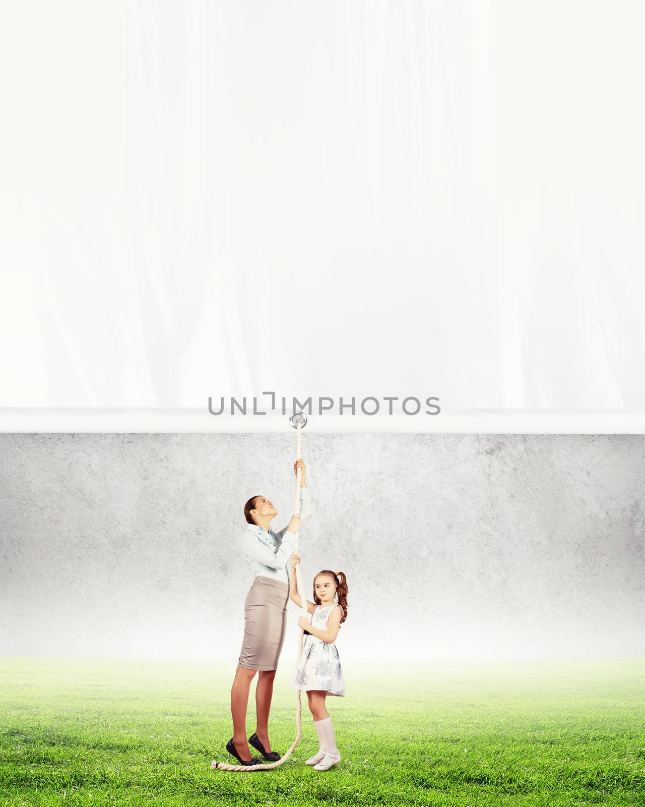 Woman and little girl pulling banner by sergey_nivens