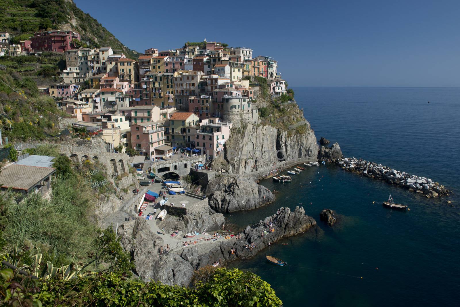 View of the picturesque village of Manarola in the heart of the Cinque Terre, important national park and world heritage of unesco