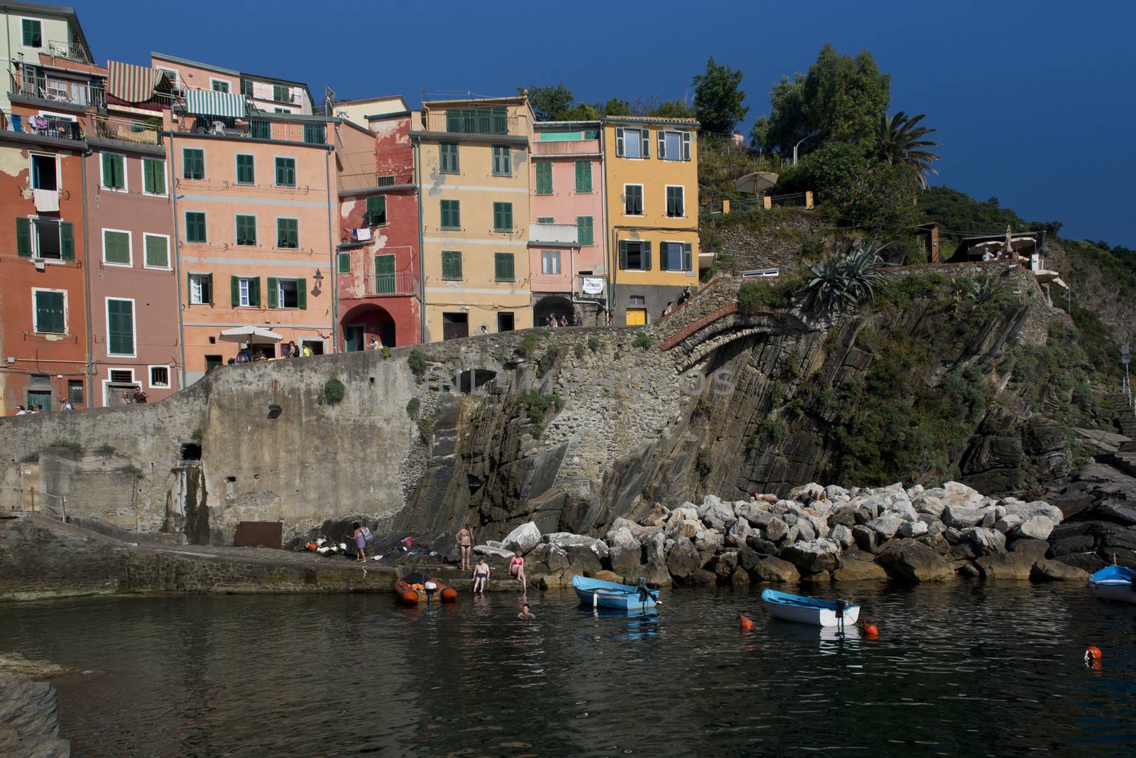 View of the picturesque village of Riomaggiore in the heart of the Cinque Terre, important national park and world heritage of unesco