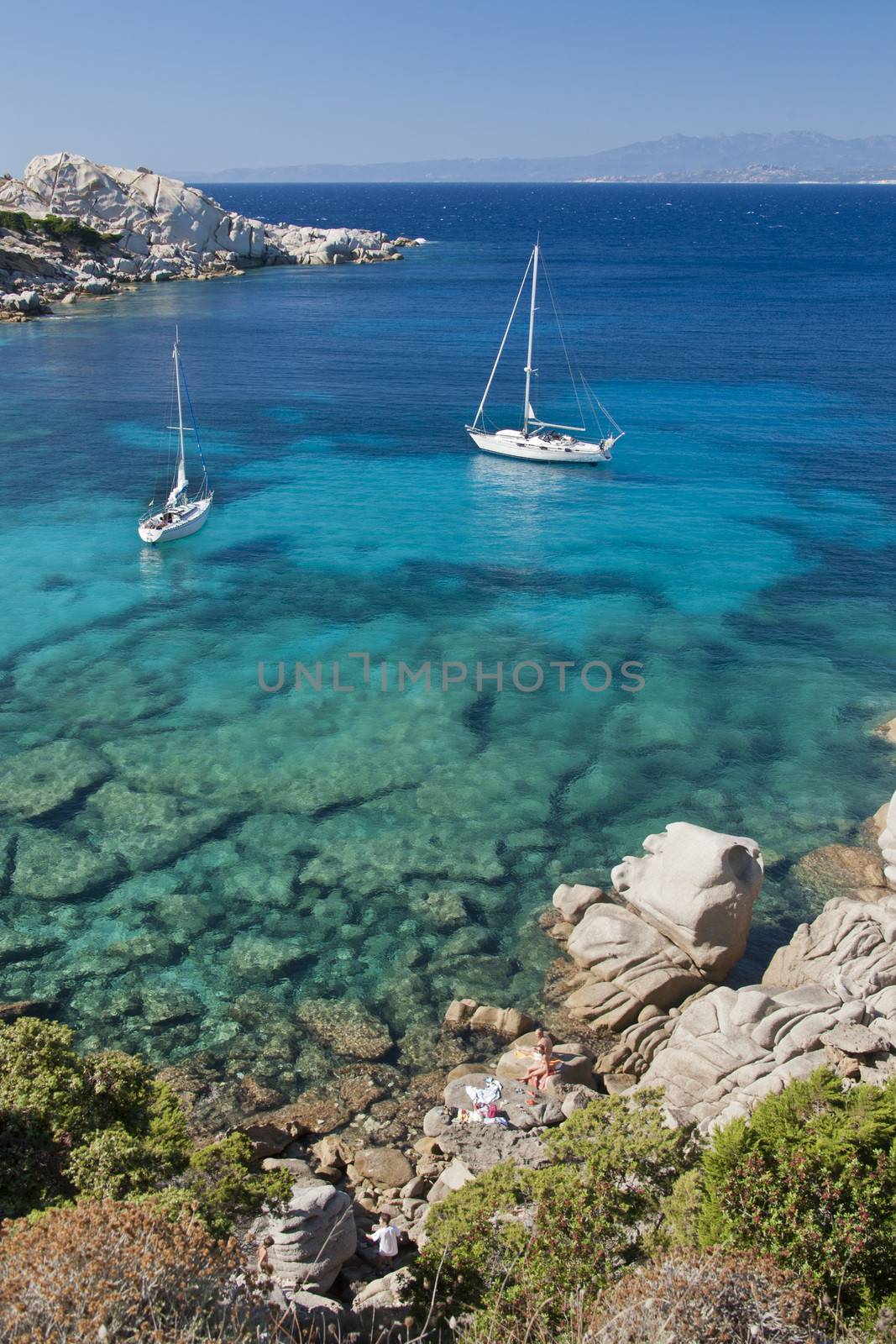 The wonderful colors of the sea in cala spinosa, a bay of Capo Testa, in Gallura