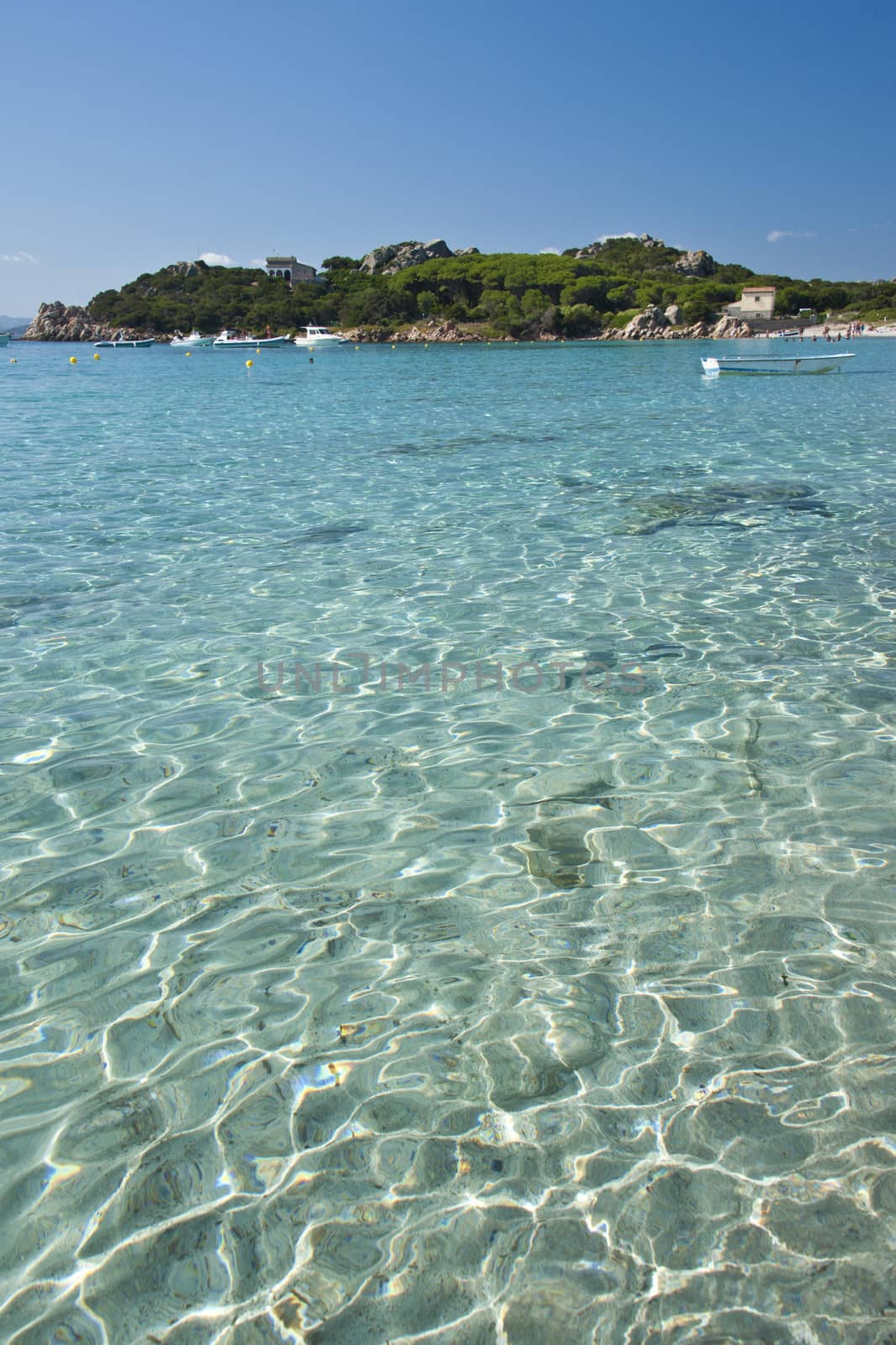 The wonderful colors of the sea in Santa Maria beach, an island of the La Maddalena archipelago in Sardinia, Italy