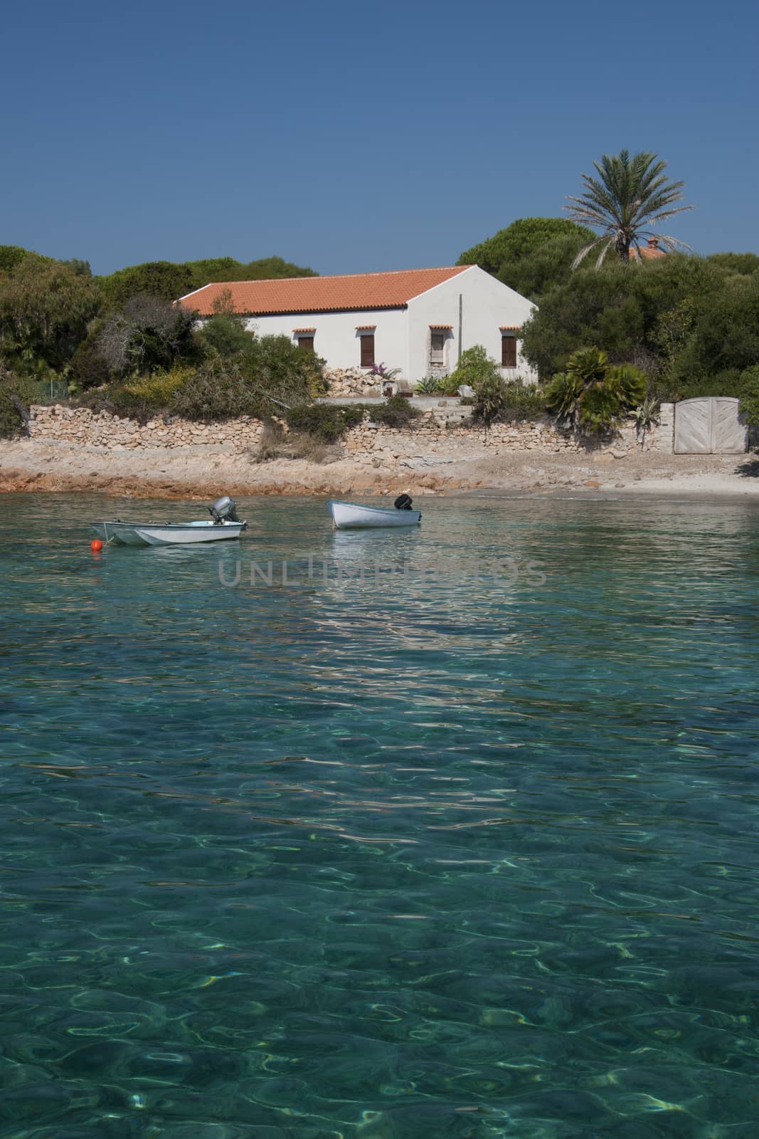 The wonderful colors of the sea in Santa Maria beach, an island of the La Maddalena archipelago in Sardinia, Italy