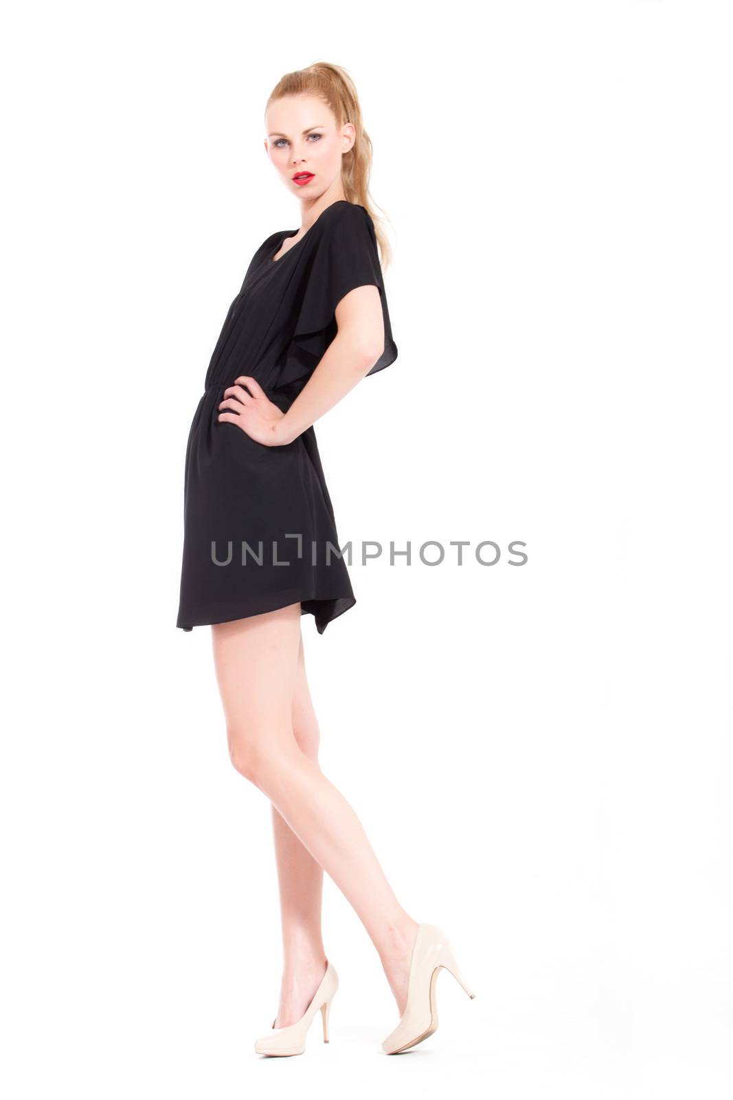 Beautifull young blond woman in the studio