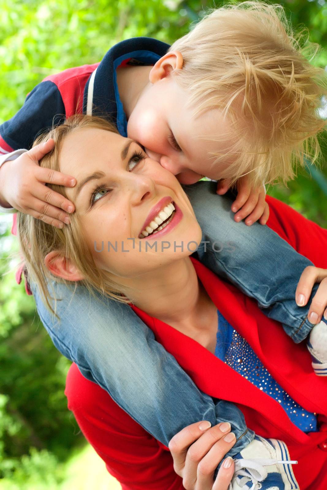 Happy mother and son having a nice day in the park