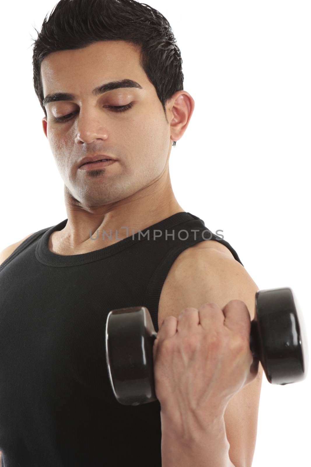 A man works his biceps triceps using a hand held weight