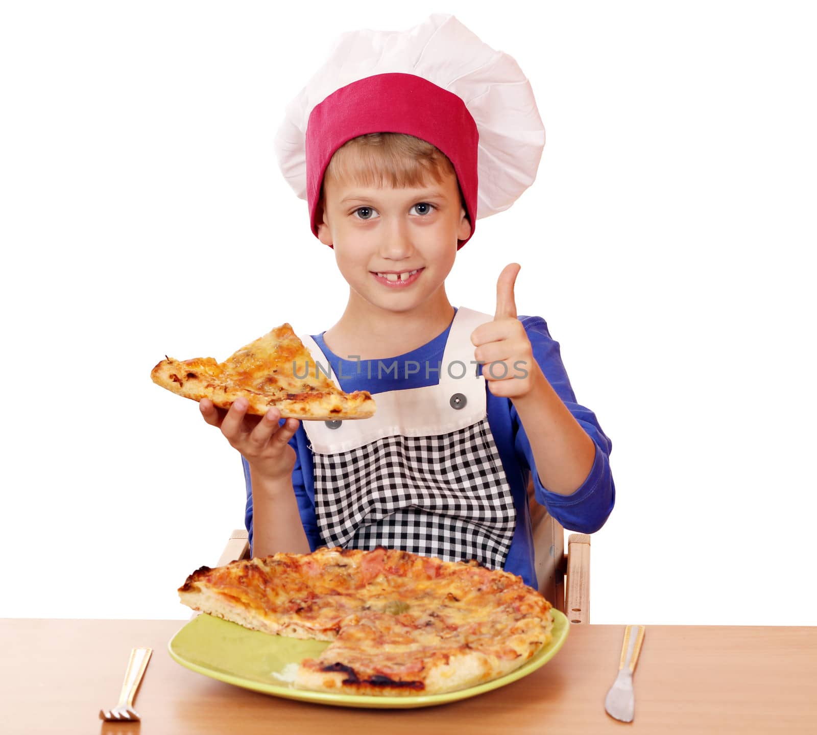 happy boy chef with pizza and thumb up by goce