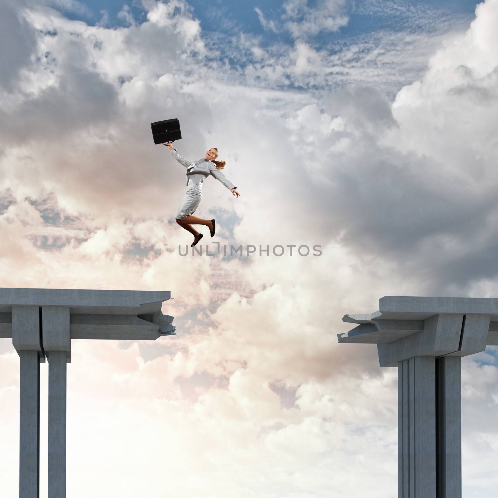 Young woman jumping over a gap in the bridge as a symbol of risk