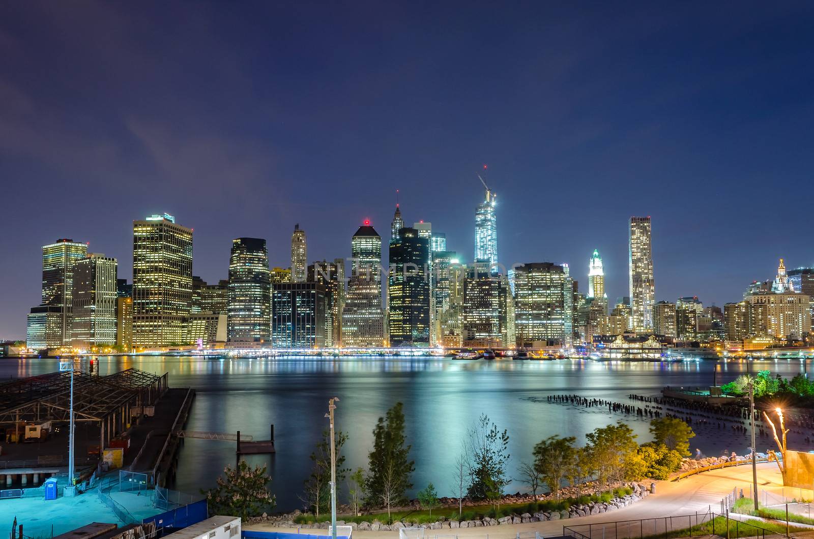 Manhattan Skyline at Night by marcorubino