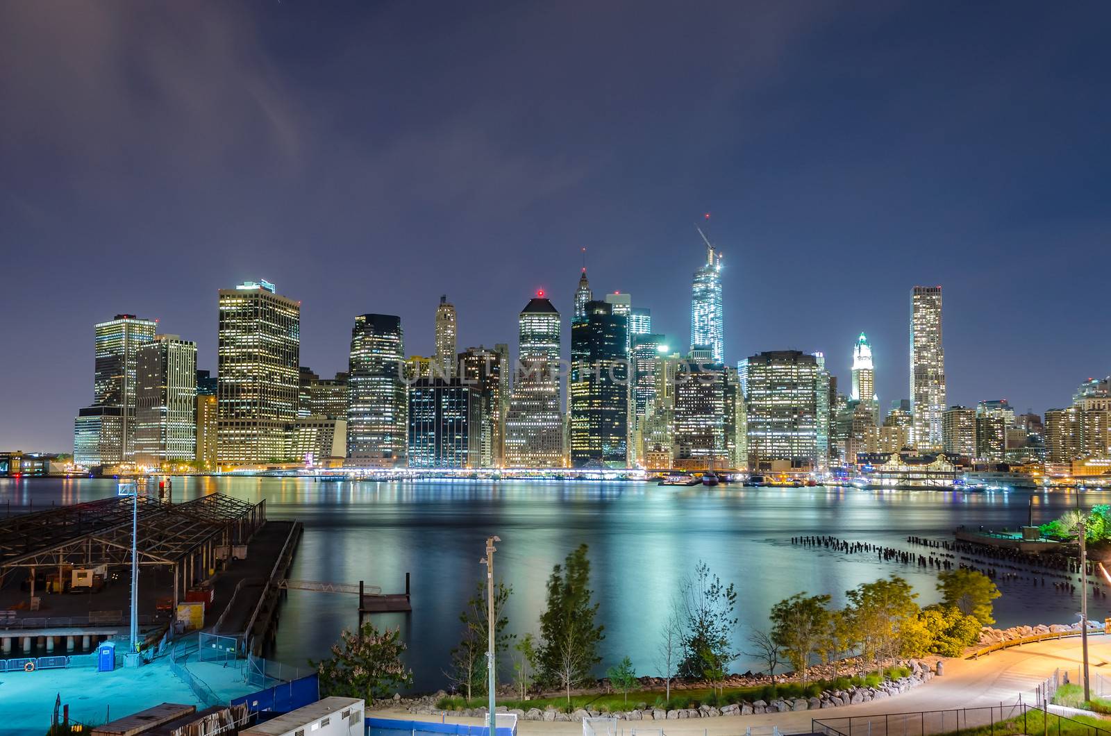 Manhattan Skyline at Night by marcorubino