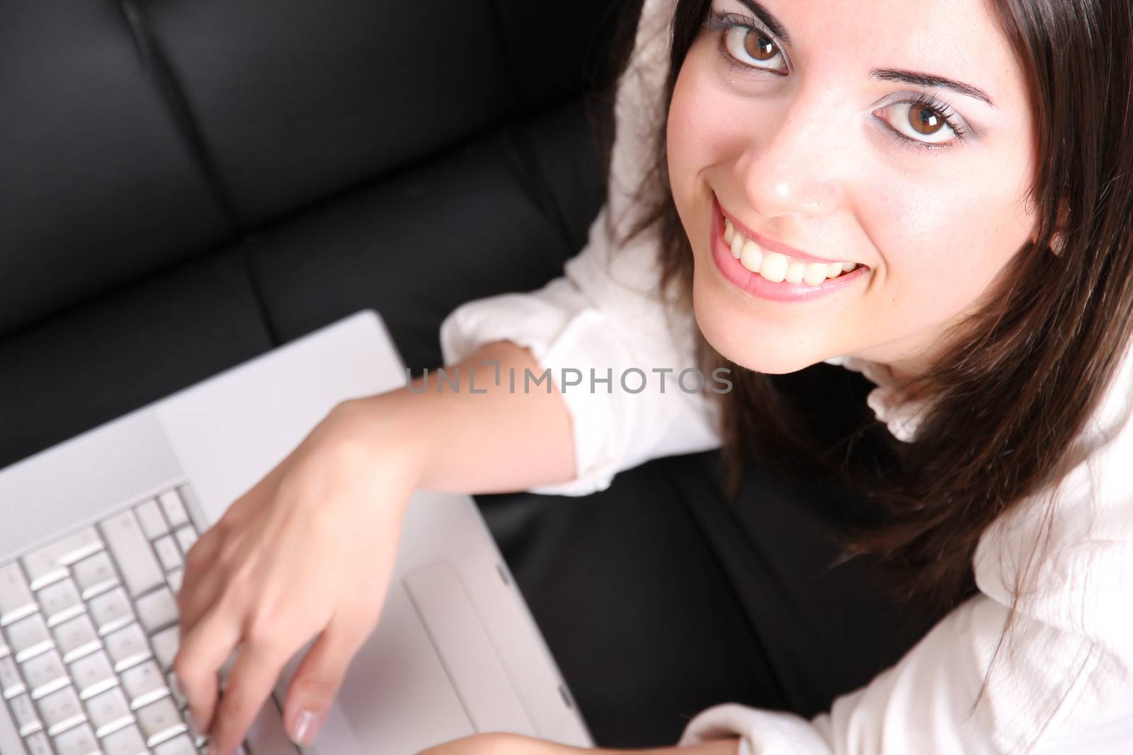 Young Hispanic Woman surfing on the Sofa	 by Spectral