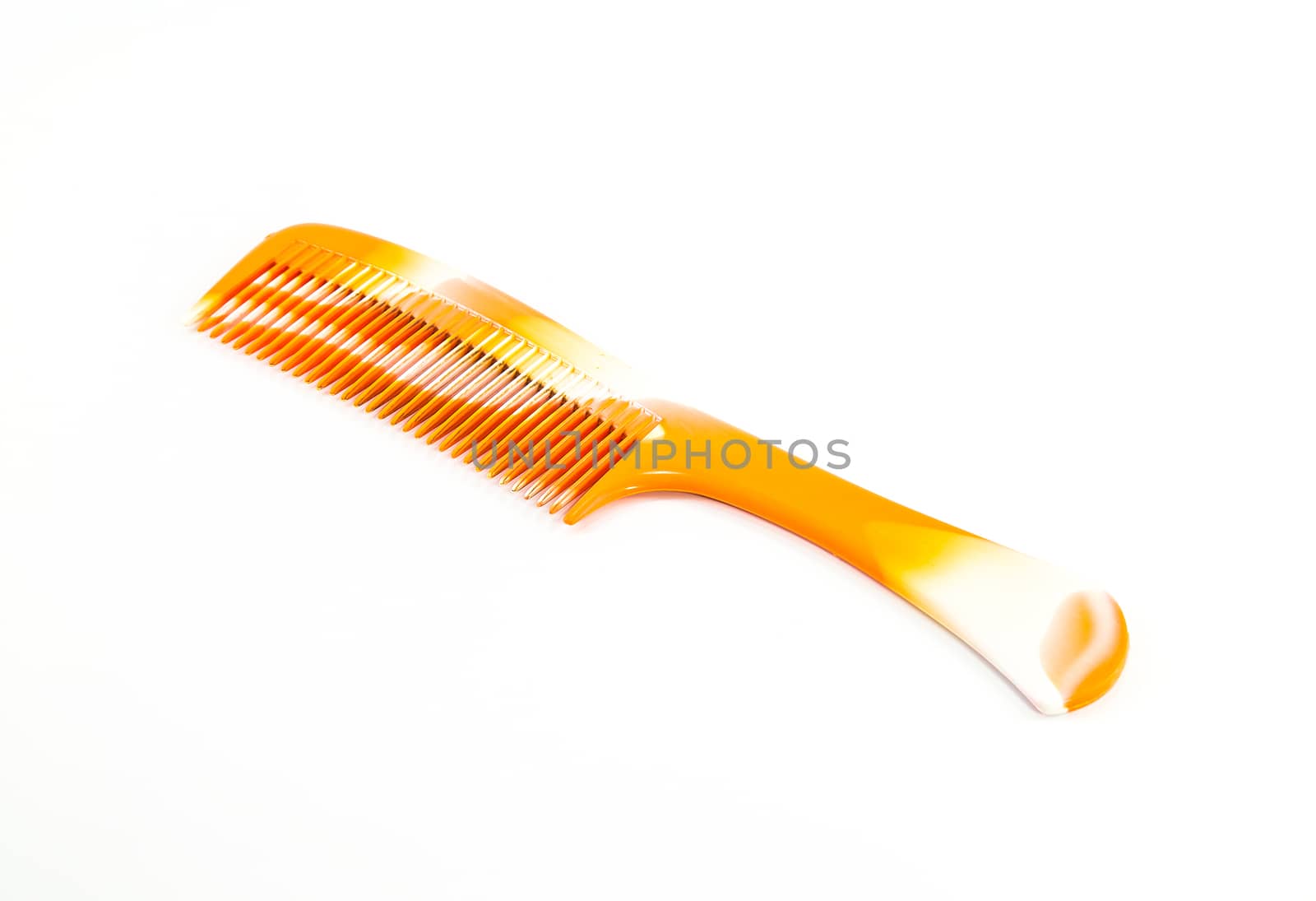 Orange comb for hair; isolated on white background