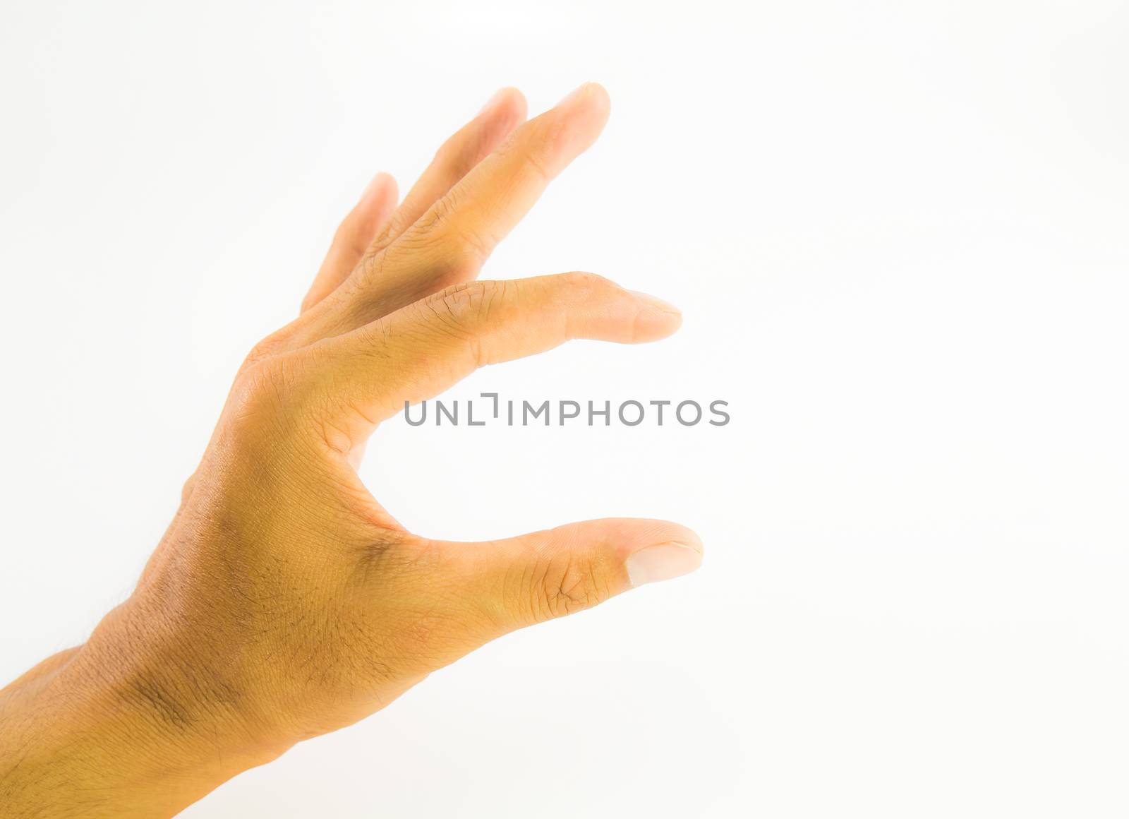 Hand measuring invisible items. Isolated on white background